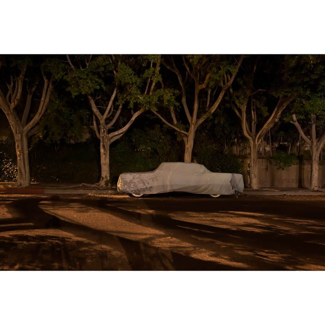 Gerd Ludwigさんのインスタグラム写真 - (Gerd LudwigInstagram)「I am excited to share that the F15 Gallery in Bremen, Germany is currently presenting my exhibition titled SLEEPING CARS.  The exhibit features 21 large photographs of resting cars at night throughout Los Angeles, undeniably the city of cars. Vehicles are the blood in the veins of this metropolis. I have documented where these iconic Los Angeles inhabitants reside at night — tucked into driveways, proudly displayed in front of homes, glowing under streetlamps, covered with tarps, or simply left bare — aiming to evoke a mysterious quality reminiscent of the almost forgotten backdrops of the noir films so typical of Hollywood and Los Angeles.  My cars are loners. They command their own space and like to show their presence. Like a devoted bird watcher I have learned to recognize their sleeping patterns. With voyeuristic pleasure I’ve spied on them in their nightgowns. I’ve watched some sleep in the nude; some take afternoon naps and a few lucky ones get to sleep together.  In addition to the SLEEPING CARS series, the exhibition will feature a small selection of my images of Joseph Beuys captured in 1978.  If you are from or in the area, I would like to invite you to attend the exhibit, which will open on April 14th at 6 pm. I look forward to seeing you at the opening.  The exhibition will be on view through June 17, 2023.  @f15gallery #f15 #SleepingCars #exhibit #Bremen」4月11日 7時44分 - gerdludwig