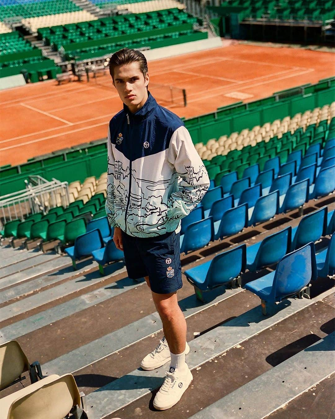 セルジオタッキーニさんのインスタグラム写真 - (セルジオタッキーニInstagram)「Introducing our Monte Carlo 2023 Collection.   For 15 years, Sergio Tacchini has proudly sponsored the Rolex Monte Carlo Masters, an annual tennis tournament hosted at the prestigious Monte Carlo Country Club in Monaco. Continuing the longtime partnership, we're pleased to present our latest ST x Monte Carlo Collection—featuring MCCC's distinguished crown logo alongside a gestural ink sketch depicting the club’s picturesque Mediterranean locale. Inspired by luxury lifestyle along the Riviera, the premium capsule includes a Crepe de Chine cabana set, crinkle nylon track set, reversible bucket hat, and court-ready staples. Check out the full lookbook at the link in bio, photographed at MCCC's iconic clay courts.」4月11日 1時38分 - sergiotacchini