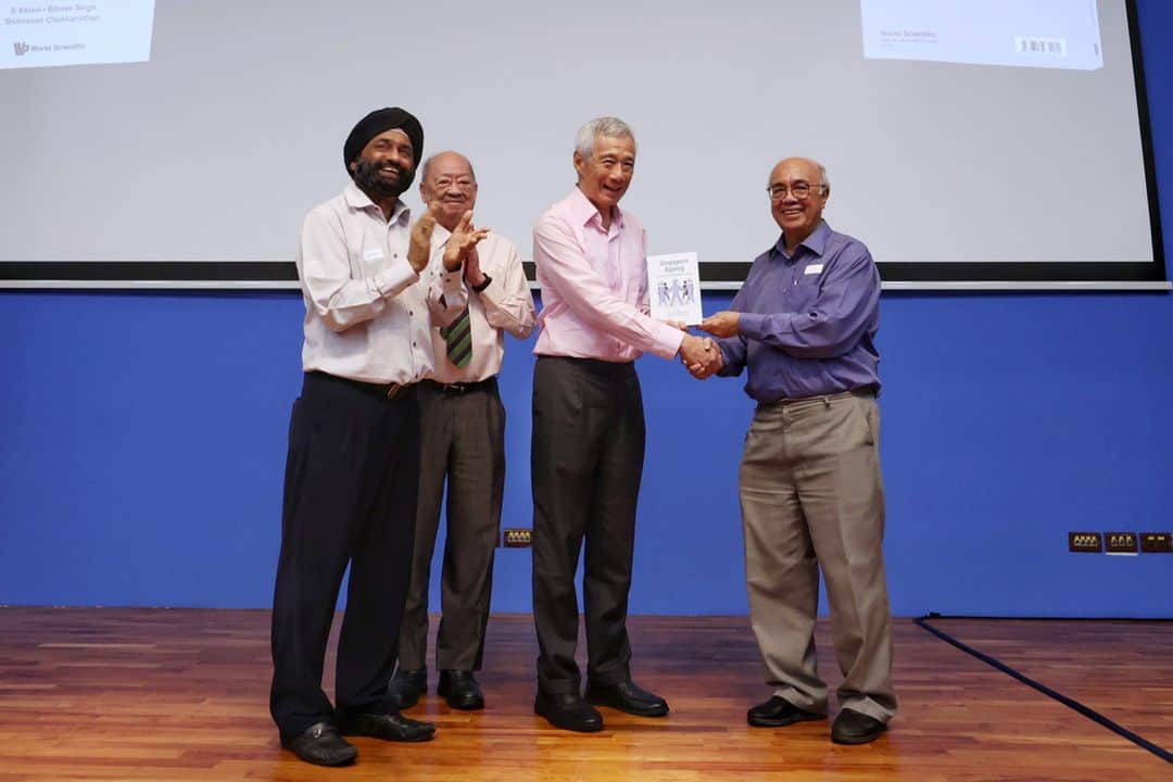 リー・シェンロンのインスタグラム：「Countries all over the world are facing the problem of ageing populations. Singapore is not alone in addressing this challenge.  In their newly launched book, ‘Singapore Ageing - Issues and Challenges Ahead’, edited by Dr S Vasoo, Professor Bilveer Singh, and Professor Srinivasan, the contributors share their thoughts on this pressing topic. They presented one possible grim scenario – escalating healthcare costs burdening the economy, and societal fractures from competing needs across different demographic groups.   Singapore is determined not to end up there. We will push things in the right direction, by raising the retirement and re-employment ages as lifespans lengthen, ensuring retirement adequacy, and strengthening our healthcare system to meet the increasing demand.  These things require a concerted effort from everybody. We all need to embrace ageing positively. Only then can we come together with the right mindset and strategies to tackle ageing in our society.   I congratulate the editors and contributors on the launch of their book! – LHL  (MCI Photos by Betty Chua)」