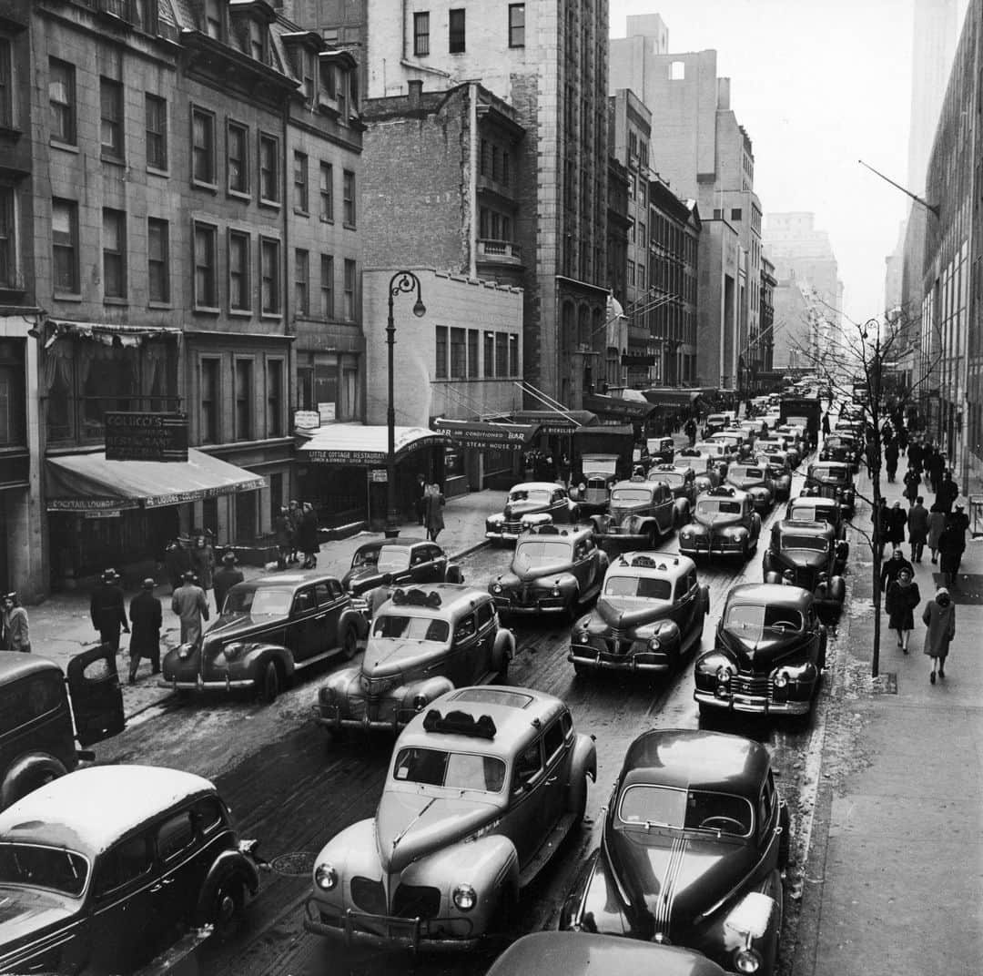 lifeのインスタグラム：「Bumper-to-bumper traffic of taxicabs & cars moving toward 6th Avenue on 51 Street, New York City, 1945.   Visit the link in bio to see more from All Hail New York Taxis: Gotham Cabs and Cabbies of the 1940s 🚕  (📷 William Shrout/LIFE Picture Collection)  #LIFEMagazine #LIFEArchive #WilliamShrout #NewYorkCity #Taxis #Cabs #1940s」