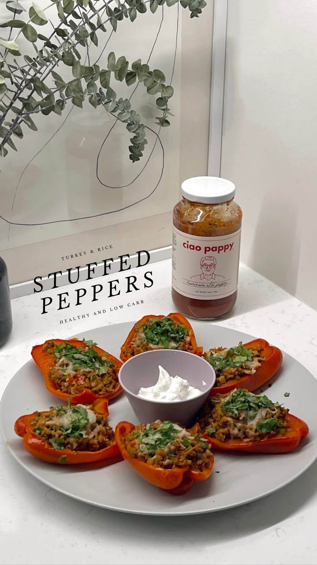 SONYA ESMANのインスタグラム：「Before trader joes sold & then discontinued (boo 👎) their beloved stuffed red peppers, my mom made them for me growing up, and as an adult I’ve made it one of my life missions to master the recipe. It’s simple to make and filled with protein to keep you strong & eatin good all week. All you need is some red peppers, garlic, a yellow onion, rice and your favorite marinara. Truthfully when I was learning to make these and experimenting with the recipe- I learned quickly that canned tomatoes, which is what most recipes call for, didn’t work for me. It didn’t taste the way I remembered it. Which is why I love @ciaopappy marinara for how well-spiced, authentic and fresh it tastes on everything from pasta to these stuffed peppers. I don’t see how this recipe couldn’t be life-changing if you’ve never tried them <3 @fromthelobby  Ingredients: * 3–4 large bell peppers, insides removed * 1 tablespoon olive oil * 1 pound ground turkey (feel free to use your vegan ground “meat” of choice) * 1/2 diced yellow onion * 3 cloves garlic, minced * Italian seasoning * Salt, to taste * Freshly cracked black pepper * Crushed red pepper flakes * Ciao Pappy Marinara Sauce * 1 cup cooked brown rice or cauliflower rice (I used TJ’s frozen Mexican cauliflower rice) * Mozzarella cheese  * Preheat oven to 375 degrees. Place the peppers in a pot of boiling water for about 10 mins * 1. Heat a large deep skillet over medium-high heat. Once hot, add the olive oil and then ground turkey. Brown the turkey, breaking it up as it cooks. *I added the onions and garlic first, but it took longer to cook, so add the turkey first* 2. Once the turkey is brown, add the diced onion, minced garlic, Italian seasoning, salt, black pepper, and red pepper flakes. Cook for 3-4 more minutes or until the onion is tender. 3. Stir in the brown rice and add the marinara sauce. Let the sauce simmer for 2-3 more minutes. Remove from the heat and add cheese. 4. Stuff the pepper halves with the filling and place them on a baking sheet. 5. Bake uncovered at 375 degrees for 20-25 minutes. 6. Remove from the oven and garnish with fresh cilantro or parsley, hot sauce if you love spicy food, and eat with sour cream #ourplace」