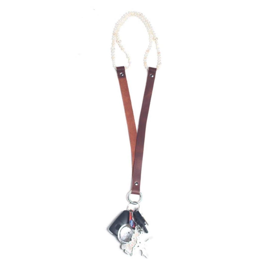 ピーターイェンセンのインスタグラム：「Pearl lanyard available online now $145. Collaboration with @kmmandco. Made and produced in Atlanta, GA. Image: @tylerbasa  Models: @tylerbasa @cory.slr   #yourstrulybypeterjensen」