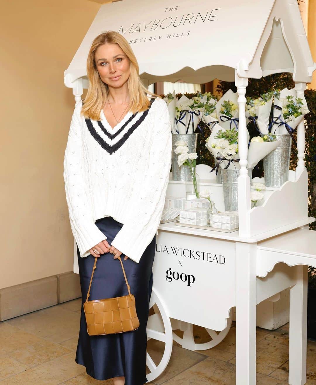 アリッサ・ジュリア・スミスのインスタグラム：「A bit of London in LA… 🫖🍰Had a lovely afternoon tea party with @claridgeshotel to celebrate an iconic collab between @emiliawickstead & @goop !  Always love attending these events because I meet so many inspiring women. 🫶🏼  Tennis sweater by G. Label    {more details in stories}」