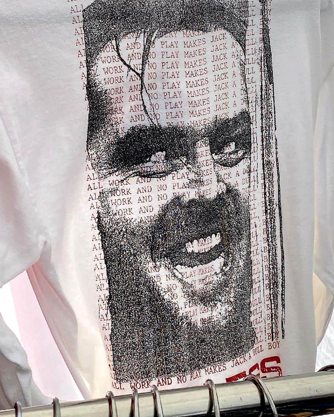 Shepard Faireyのインスタグラム：「My friends and co-workers Jason Filipow (@p1brand) and Mike Ternosky (@oldmanternosky) found this shirt of a very old design of mine at the Rose Bowl flea market selling for $500! In the summer of 1989, the same summer I made the original "Andre the Giant Has a Posse" sticker, I also did a design for a local Providence skate/streetwear company called JOBLESS ANTI-WORK WEAR. I had submitted a drawing of a kid skating in a pool as a tee graphic which was rejected because they said they were looking for less literal skate stuff and more graphics that reflected the skate/street rebellious attitude. Based on the name of the company, my love of Kubrick's film "The Shining," and my recollection of exactly which film still would make a provocative graphic, I set out to make an intentionally rough and degraded visage of Jack Nicholson that screamed, "I don't like work" with a dose of danger and bad attitude. Conveniently, Nicholson's character in "The Shining" was supposed to be writing a novel, but as he went insane from isolation, he simply typed hundreds of pages of "ALL WORK AND NO PLAY MAKES JACK A DULL BOY." I typed this phrase out with a few variations, laid it under the degraded face in red, added the Jobless logo in red beneath, and the design was complete. It took about an hour and a half. This shirt was my first underground "hit"… it sold very well and boosted my confidence as a designer. It also, ironically, landed me a job working for Jobless as their primary designer and printer through 1990 until I started my own company, Alternate Graphics, in the summer of 1991. –Shepard  #JOBLESSANTIWORKWEAR #FLASHBACKFRIDAY」