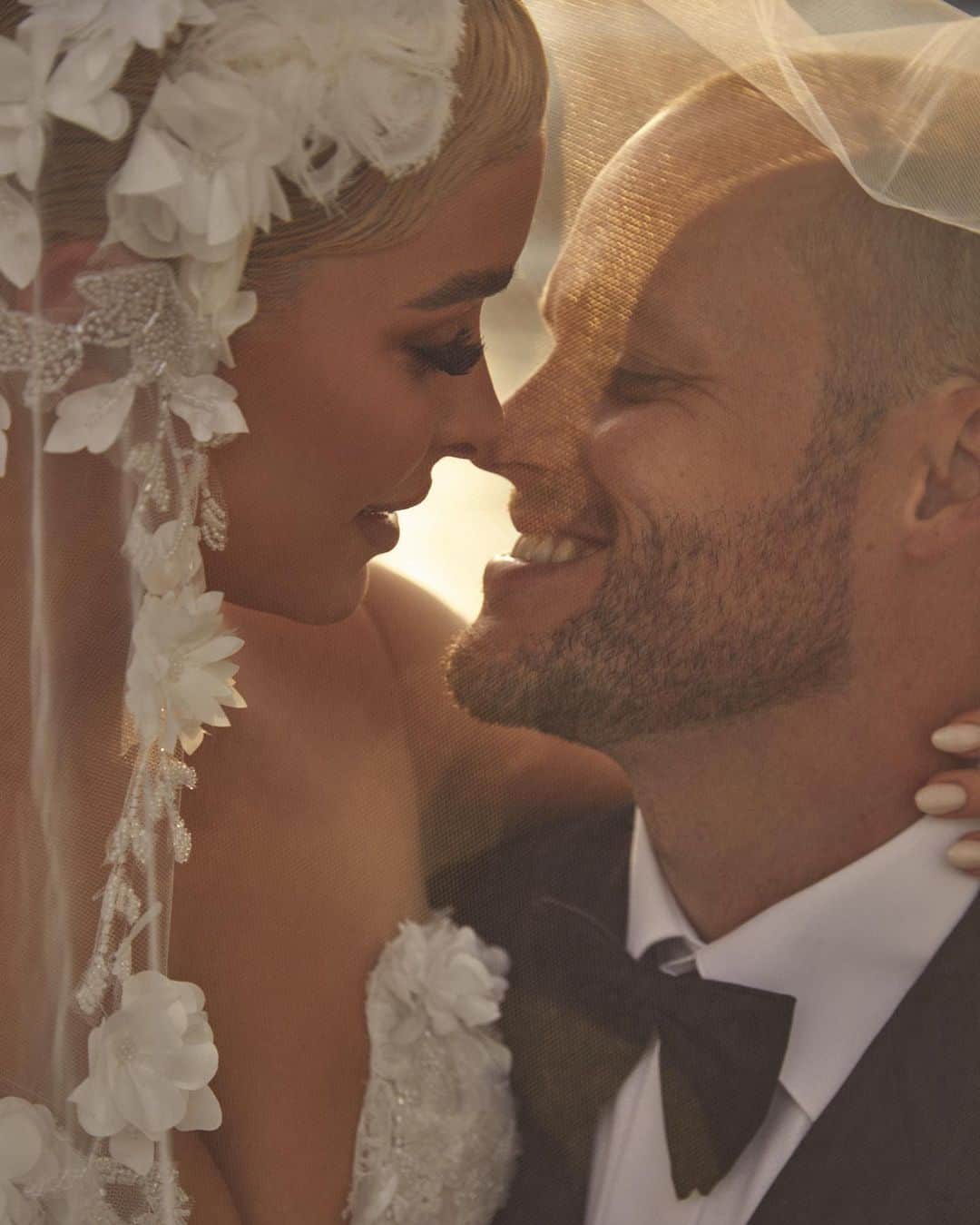 エリー・ゴンサルヴェスのインスタグラム：「Just married.   feat. @vogueaustralia & @gladys__lai   the day of our dreams.. Wedding Planner | Stylist @alysiabridgerevents Wedding Venue @laluna.beachclub Photography @laurenschulzvisuals Film @followcaio @dominicthwaite  Accommodation Venue @palazzoversace  Transport @porschecentreGC Super Yacht @rivieraboats   Bridal gowns @oglialorocouture  Ross’s Suit @dyonsu Jewellery @calleijajewels  Hair @brodieleerokstar @LorealPro Make Up @alexperrinmua Media @weddedwonderland  Stylist @styledbybloom_  Flowers @theblossomtreecompany  Bouquet @mrsgibbonsflowers  Candles @candlesbyjessica  Champagne Tower @champagnewalls_goldcoast  Sax @mrsaxaustralia  Wedding Cakes @ekats  Fireworks @osmicproductions  Celebrant @marriedbyjake Private Dinner caterer @chef_mcleod @alfreshco_catering  Bridal robes @homebodii」