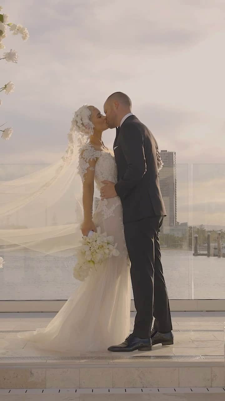エリー・ゴンサルヴェスのインスタグラム：「How did I get this lucky in life to be your wife @ross.scutts   Film. @followcaio @dominicthwaite   Wedding Planner | Stylist @alysiabridgerevents Wedding Venue @laluna.beachclub Photography @laurenschulzvisuals Film @followcaio @dominicthwaite  Accommodation Venue @palazzoversace  Transport @porschecentreGC Super Yacht @rivieraboats   Bridal gowns @oglialorocouture  Ross’s Suit @dyonsu Jewellery @calleijajewels  Hair @brodieleerokstar @LorealPro Make Up @alexperrinmua Media @weddedwonderland  Stylist @styledbybloom_  Flowers @theblossomtreecompany  Bouquet @mrsgibbonsflowers  Candles @candlesbyjessica  Champagne Tower @champagnewalls_goldcoast  Sax @mrsaxaustralia  Wedding Cakes @ekats  Fireworks @osmicproductions  Celebrant @marriedbyjake Private Dinner caterer @chef_mcleod @alfreshco_catering  Bridal robes @homebodii」