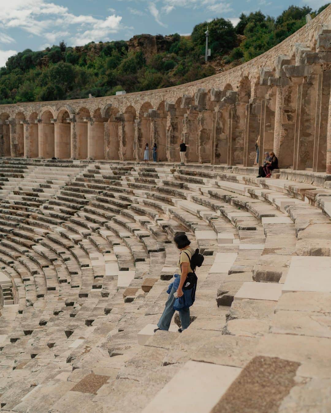 Putri Anindyaさんのインスタグラム写真 - (Putri AnindyaInstagram)「Walking in History //  Visiting Aspendos Theatre definitely one of the highlight in my life. Knowing how important the history of this place made me fall in love at every inch of this place. Turkey government took care of this place very well and it became one of the most preserved ancient roman theatre in the world. Be sure to visit this grand landmark when you visit Antalya.   also thanks to @mary_quincy for taking some snaps of me here ✨  #goantalya #goturkiye #turkey #antalya」3月29日 23時16分 - puanindya