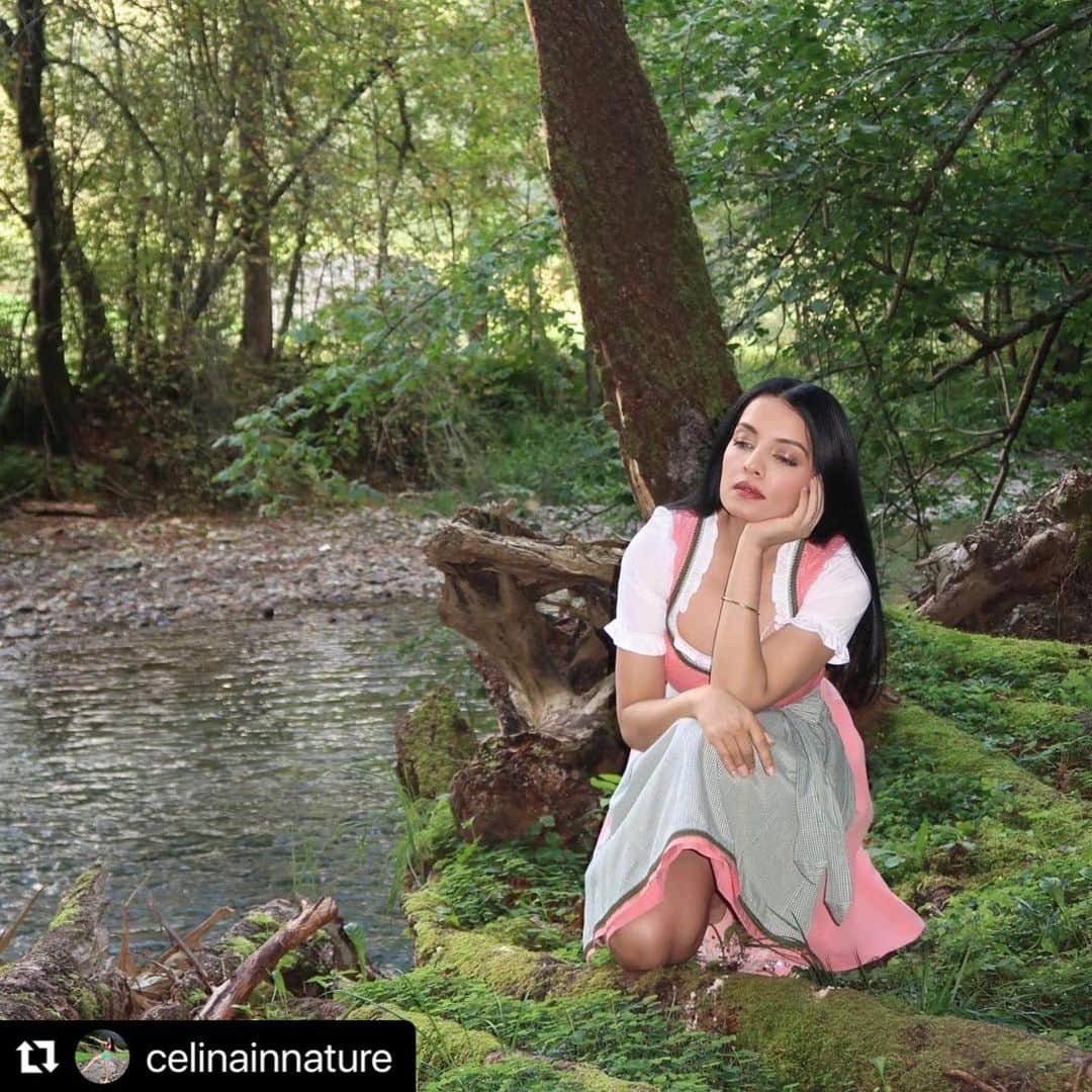 のインスタグラム：「NEW ACCOUNT FOR NATURE LOVERS : @celinainnature   If you are a #naturelover @celinainnature is your cup of caffeine. Follow for my mini personal blogs on my life in alpine #austria   #Repost @CELINAINNATURE  ・・・ Hans Christian Andersen-The famous Danish fairytale writer once said : “Everything you look at can become a fairy tale and you can get a story from everything you touch!”  I always like to romanticise my experiences in nature with pixies and elves, my upbringing was like that. My nature and wildlife loving grandfather always said : “Those who don't believe in magic will never feel it.” He was a colonel in the army and a devout nature lover. We both would go for long walks in the forests of the Kumaon hills when he would visit and amidst magical spots in the very wild Tiger laden forests, he would make me close my eyes and ask me feel the magic of nature in my heart.  I couldn’t have asked for more magical moments than those as a child. Whenever I miss him I always go to my favourite spot in our alpine surroundings in Austria, close my eyes and become one again with the magic that he inculcated in my soul as a child.    In memory of my beloved grandfather : Colonel Eric Francis (12 Rajputana Rifles ) 🤍🤍  Photograph | @haag.peter 🤠  #austriangirl #fairytale #naturelovers #bollywood #celinainnature #celinajaitley #celinajaitly #dirndl #mountainlife」
