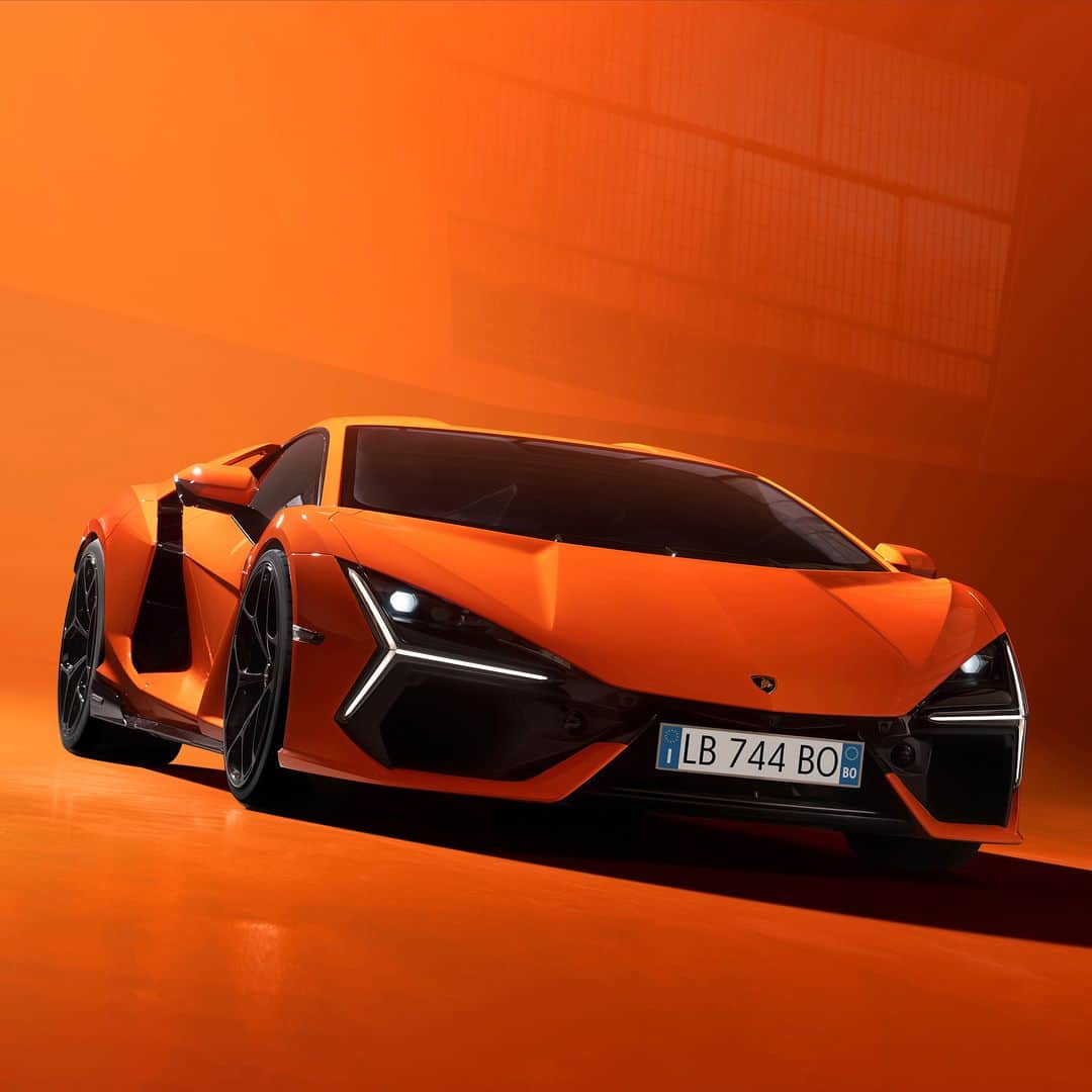 ランボルギーニのインスタグラム：「The new Lamborghini Revuelto breaks the mold, from every angle. A car that is not just a car: it’s our first ever Super Sports V12 plug-in hybrid HPEV. Thanks to its 1015 CV naturally-aspirated 6.5-liter electric engine, 13 driving modes, the aeronautics-inspired "monofuselage" chassis, an architecture that allows for optimal weight distribution and many other features designed to drive history beyond. Power has changed its shape. From Now On.  #Lamborghini #Revuelto #FromNowOn __ The vehicle is not yet offered for sale and is therefore not subject to Directive 1999/94/EC. The fuel consumption and emissions data is in the type approval stage」