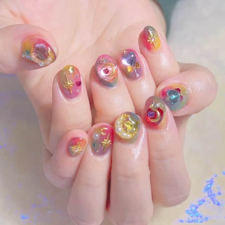 なかやまちえこのインスタグラム：「魔法少女ネイル🪄⠀ ⠀ @chikachocolat_melty ちゃん⠀ ⠀ #nail #nails #nailart #ネイル #美甲 #ネイルアート  #japanesenailart #manucure #japanesenails #manicurist #gelnails #أظافر #네일아트 #미용  #เพ้นท์เล็บ #artedeuñas #เพ้นท์เล็บเจล #ジェルネイルデザイン #ネイルデザイン #nagelkunst #魔法少女ネイル #かわいい #かわいいネイル #ゆめかわ #ゆめかわネイル ⠀ @aby_sharenail ⠀ @pregel.jp」