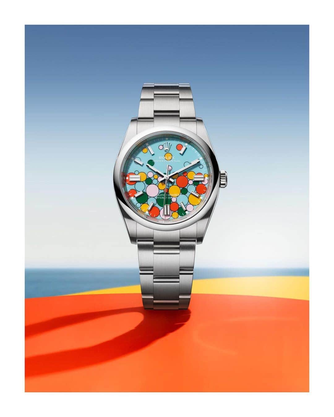 rolexさんのインスタグラム写真 - (rolexInstagram)「The new dial motif of the Oyster Perpetual is composed of differently sized bubbles fringed with black and encapsulates five vivid colours: candy pink, turquoise blue, yellow, coral red and green. This effervescent, euphoric design is the product of masterful technique. The dial decoration is carried out in strictly controlled conditions and requires the utmost precision at every stage to create a marvel of colour. #Rolex #OysterPerpetual #WatchesandWonders2023」4月4日 0時00分 - rolex