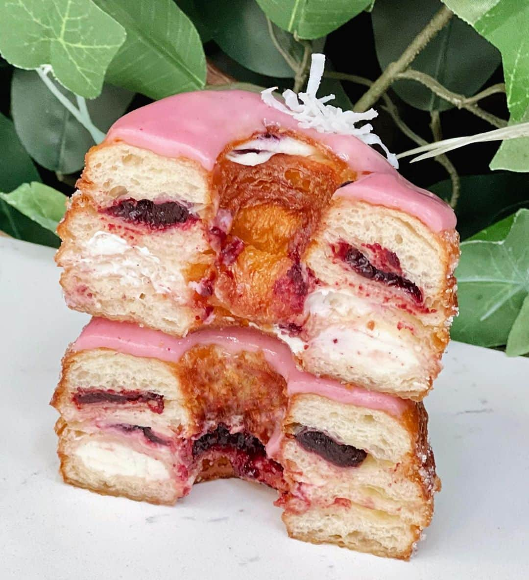 DOMINIQUE ANSEL BAKERYさんのインスタグラム写真 - (DOMINIQUE ANSEL BAKERYInstagram)「Blackberry & Coconut for NYC’s Cronut® flavor here in Soho, filled with blackberry jam balanced with creamy coconut ganache. We’re shipping ✈️ at DominiqueAnselOnline.com. Preorders for SoHo are up at CronutPreorder.com for pick-ups 2 weeks out (and you can skip the line too). #Cronut #DominiqueAnsel」4月4日 0時57分 - dominiqueansel