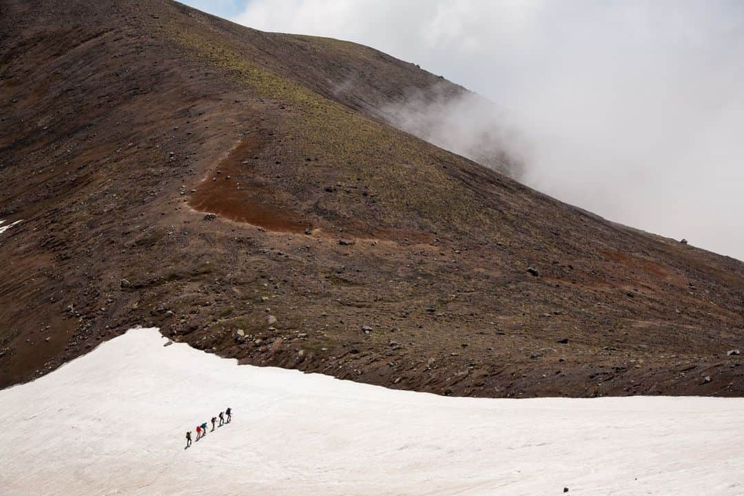 Michael Yamashitaさんのインスタグラム写真 - (Michael YamashitaInstagram)「Daisetsuzan Spring  End of the season: Stripes of snow and spring green on the slopes of Asahidake Volcano, Daisetsuzan National Park, Hokkaido, Japan. Only the heartiest and most experienced backcountry skiers will take on the mountain's challenge for spring skiing on the melting slopes.  #Japan #AsahiDake #volcano #hokkaido #Daisetsuzan」4月4日 1時12分 - yamashitaphoto