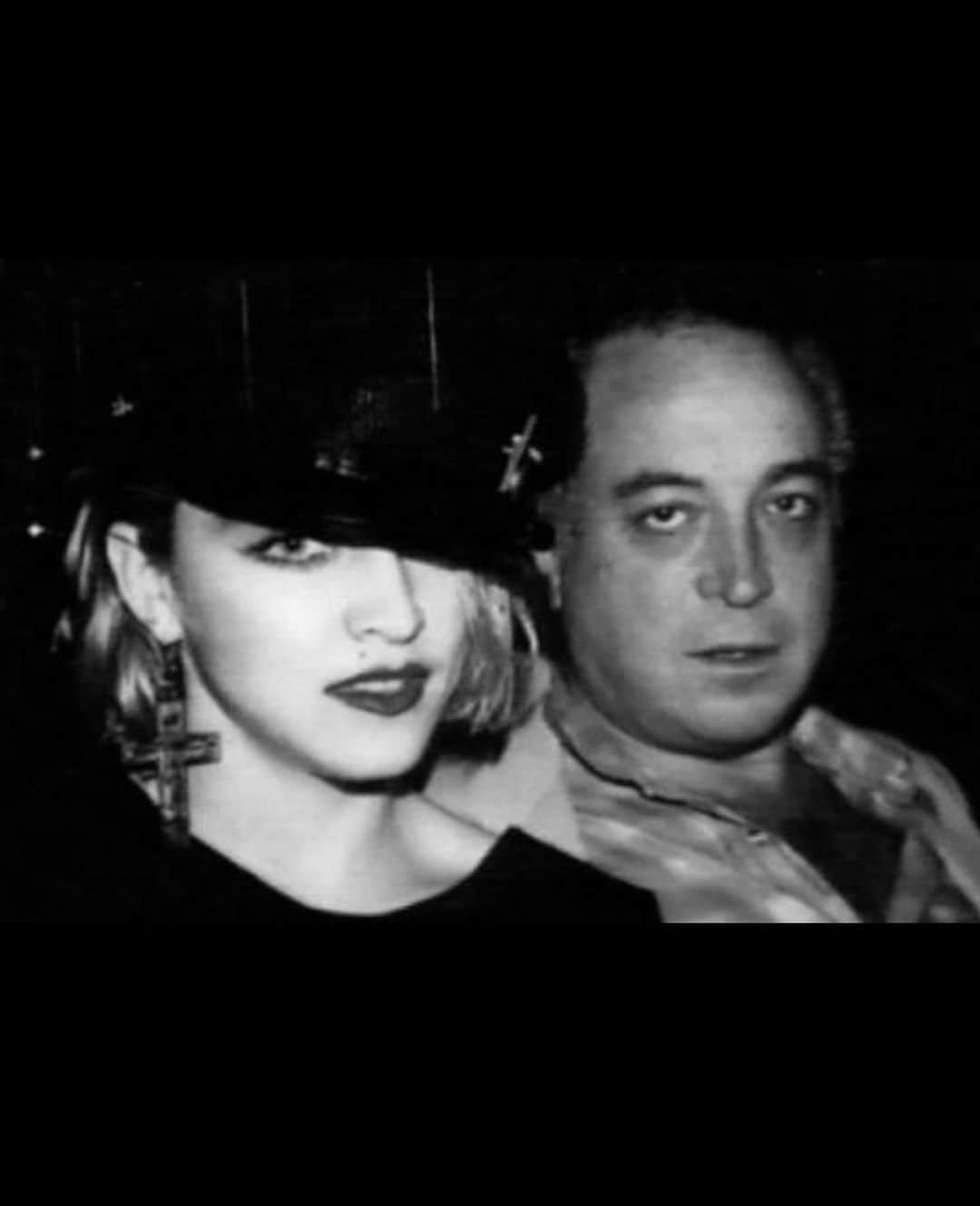 マドンナのインスタグラム：「Seymour Stein Has Left Us! I need to catch my breath.  He  Was  one of the most influential Men in my Life!! He changed and Shaped my world. I must Explain.   I stalked a DJ  named Mark Kamin- for a year at a club called Danceteria! In the Early 80’s.  He finally agreed to play my demo of a song called “Everybody” on a Saturday night.  The Club was packed. An A&R man from SIRE records was there—Michael Rosenblatt.  He heard the music and asked me if he could bring me to meet his boss Seymour Stein.  I Couldn’t get the words “Hell  Yes”! out of my mouth fast enough!   Unfortunately Seymour was in the hospital for a  Heart Ailment!  I didn’t care.  Lets Goooooo!  When I met him he was laying in a hospital bed wearing his boxer shorts and a wife beater!  He had a cannula up his nose and a saline Drip in his arm!  He was grinning like the Cheshire Cat.  I was carrying my giant boombox ready to play My cassette for him immediately!  He smiled and laughed when he saw me and asked me if I was related to  the Virgin Mary!! Hahahhahahaa. I knew we would hit it off.  I played  him the song a few times.  He signed me to his record label that day!!  This moment changed the course of my Life  Forever. And was the beginning of my journey as a Musical Artist.  Not only did Seymour hear me but he Saw me and my Potential!  For this I will  be eternally grateful!  I am weeping as I write this down.  Words cannot describe how I felt at this moment after years of grinding and being broke and getting every door slammed in my face.   Anyone who knew Seymour knew about his passion for music and his impeccable taste.  He had an Ear  like no other!  He was  Intense -Wickedly Funny-a little bit Crazy And Deeply intuitive.  Dearest Seymour you will never be forgotten!! Thank You! Thank you Thank you! 🙏🏼 💙. . Shine on!!!」