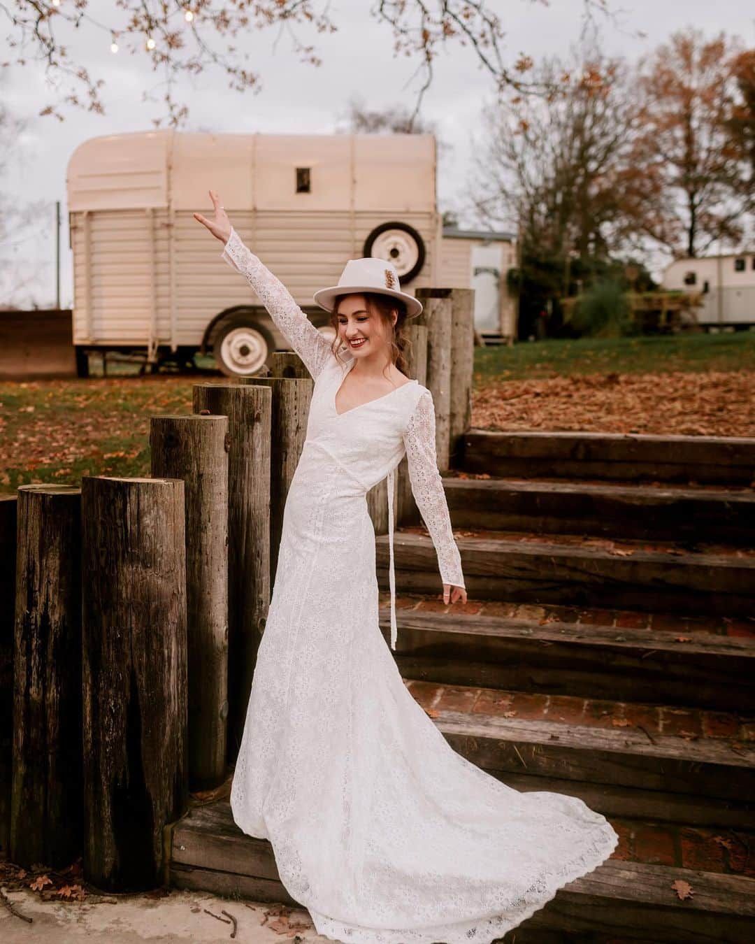 ミナさんのインスタグラム写真 - (ミナInstagram)「Throwback to this stunning winter themed photoshoot. I absolutely love how the boho, luxe, and wintery/Christmas themes all come together to create the perfect wedding setting and how our Harley and Noemie dresses complemented the rustic decor.  Read all about it on @rockmywedding   Venue @oaktreebarnweddings Wedding Planner and Styling @twobecomeoneweddingplanner Photographer @sonder.lust.photography Videographer @chrisjeromejames Props and Styling @the_prop_library Florist @thelittleflowershopltd Wedding Dresses @indiebride.london Cowboy boots & hat @melbelle.co.uk Cake Designer @allshapescake Wedding Stationery @heartedesigns Hair and Makeup Stylist @idomakeupandhair_ Celebrant @trueblueceremonies Bride Model @ioanaa_nagy Groom Model @_basil_dsouza_ Neon Sign @bayweddingprops」4月4日 17時32分 - indiebride.london