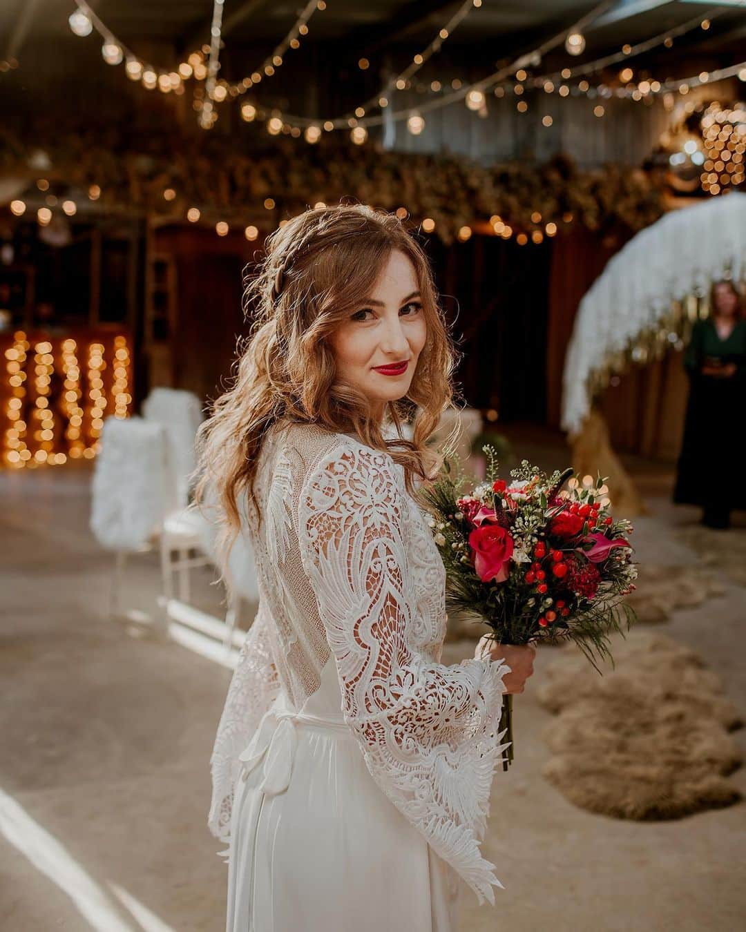 ミナさんのインスタグラム写真 - (ミナInstagram)「Throwback to this stunning winter themed photoshoot. I absolutely love how the boho, luxe, and wintery/Christmas themes all come together to create the perfect wedding setting and how our Harley and Noemie dresses complemented the rustic decor.  Read all about it on @rockmywedding   Venue @oaktreebarnweddings Wedding Planner and Styling @twobecomeoneweddingplanner Photographer @sonder.lust.photography Videographer @chrisjeromejames Props and Styling @the_prop_library Florist @thelittleflowershopltd Wedding Dresses @indiebride.london Cowboy boots & hat @melbelle.co.uk Cake Designer @allshapescake Wedding Stationery @heartedesigns Hair and Makeup Stylist @idomakeupandhair_ Celebrant @trueblueceremonies Bride Model @ioanaa_nagy Groom Model @_basil_dsouza_ Neon Sign @bayweddingprops」4月4日 17時32分 - indiebride.london