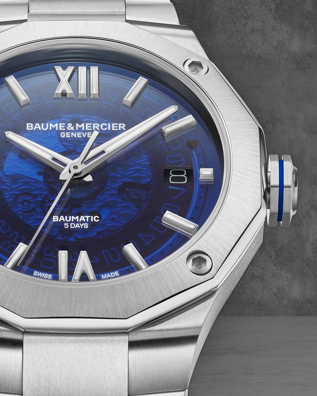 のインスタグラム：「A dodecagonal case and a transparent blue sapphire dial: the signature of our Riviera collection which celebrates its 50 years of existence and heritage. -- Riviera 10616 42 mm, Baumatic Manufacture movement, Stainless steel case, Smoked blue sapphire crystal dial, Date aperture at 3 o'clock, 5 days Power Reserve, Chronometric precision, Antimagnetic 1500 Gauss,  Fast Strap technology - Interchangeable strap system.  Eligible to 8 years of warranty upon activation  -- #BaumeetMercier  #Riviera  #Since73  #Watches #Watch #SwissMade #WatchOfTheDay #WatchesOfInstagram #WatchLover #WatchAddict #Horology #WatchCollector #DailyWatch #InstaWatch #WatchMaking」