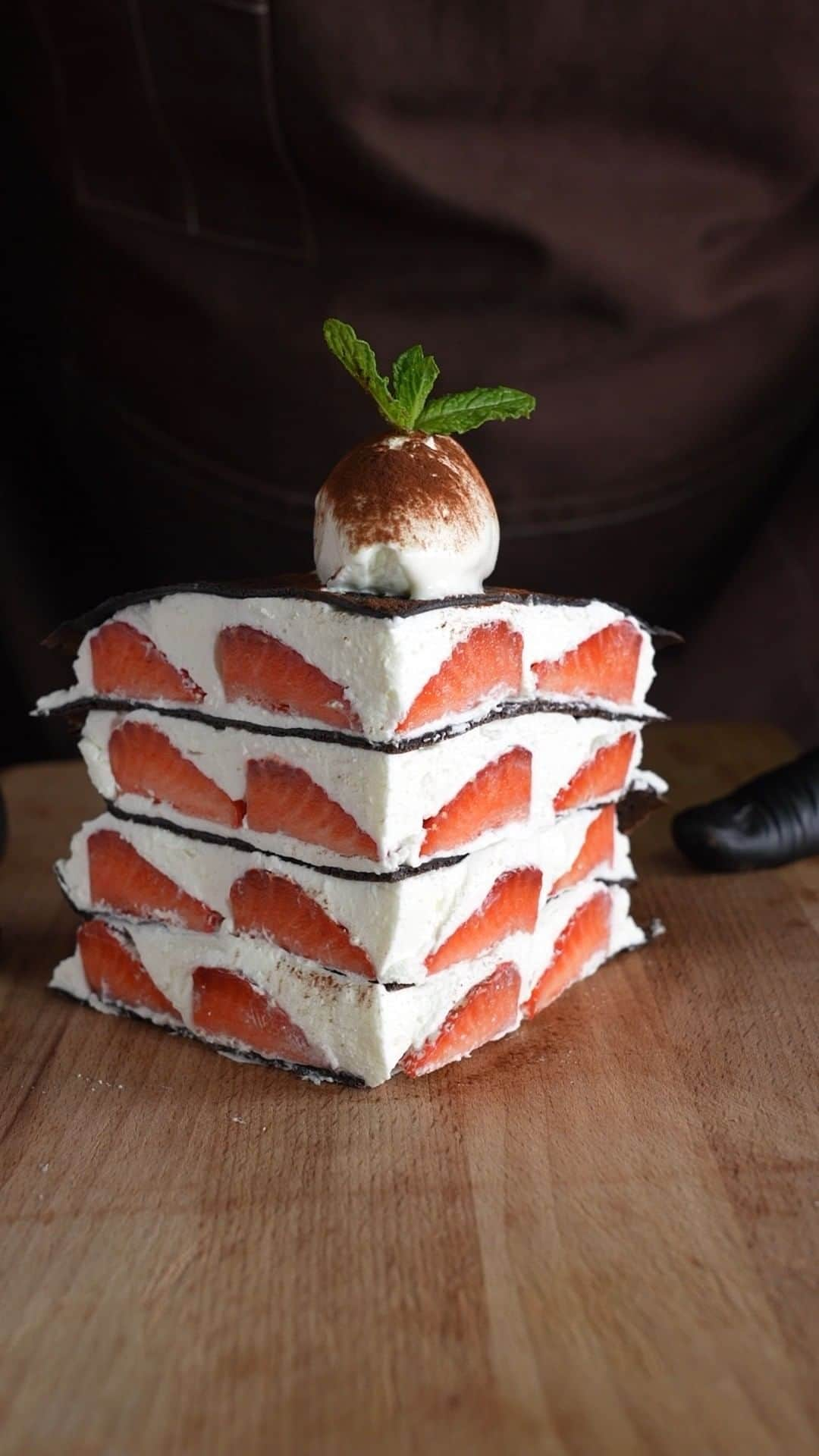 チョコレートカカオのインスタグラム：「Mille Crepe Cake Strawberry イチゴのミルクレープ  YouTube https://youtube.com/shorts/Q1heQtvu8f8  Cacao ! ∴∵ゞ(´ω`*) ♪  This time I made a chocolate mille crepe with strawberries in between. The dough was chewy, soft and very tasty. In the end, we ran out of ingredients and had to cut them into small pieces and pile them on top of each other. May the cacao be with you !  [Details video] https://youtu.be/e2OVRBgYFmQ  [Ingredients] 1 Egg 200g Milk 25g Granulated sugar  65g Cake Flour  5g Cocoa powder 5g Black cocoa powder 1.5g Baking powder 15g Unsalted butter 150g Heavy cream45% 100g Fresh cream36% 20g Granulated sugar  #Youtube #youtuber #ASMR #foodie #chocolate #foodpics #instafood #dessertporn #foodporn #レシピ #スイーツ #yummy #recipe #patisserie #recette #手作りお菓子 #video #cooking #millecrepe #millecrepecake #ミルクレープ #strawberry #イチゴ #cocoa #苺 #苺スイーツ」