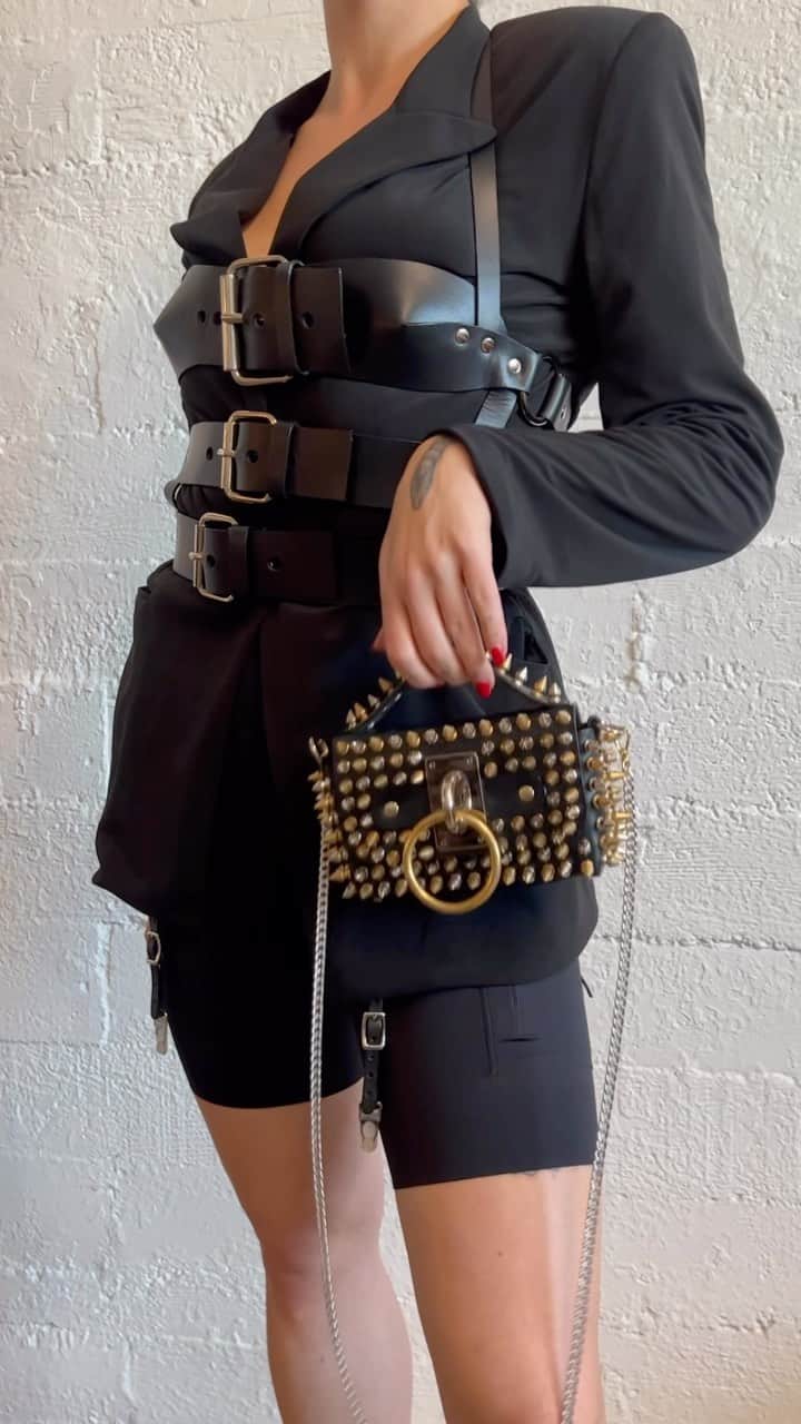 ZANA BAYNEのインスタグラム：「Introducing the TRIPLE BUCKLE BUSTIER 🌹   Triple Buckle Bustier + Malice Belt + Mini Choker Bag - Spiked & Loaded (Mixed Metals)  🎵 “Come Closer” by @boyharsher」