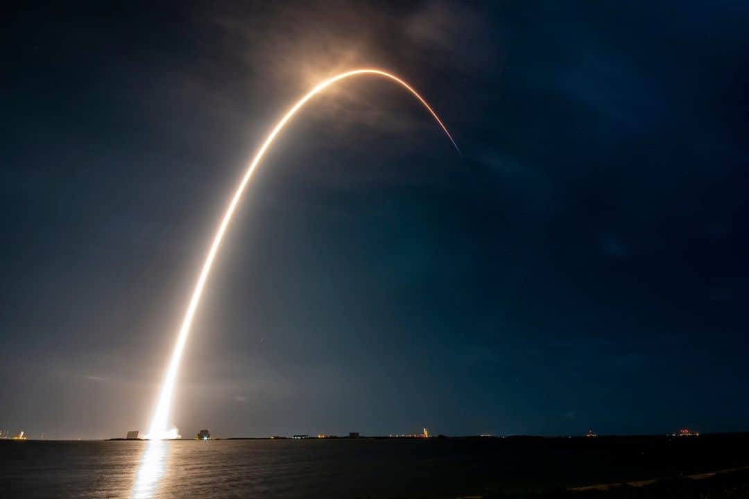 NASAのインスタグラム：「Picking up the TEMPO 🏃‍♀️   On April 7 at 12:30 a.m. EDT (0430 UTC), our @NASAEarth and @Smithsonian Center for Astrophysics Tropospheric Emissions Monitoring of Pollution (TEMPO) mission launched into orbit atop a @SpaceX Falcon 9 rocket.   Only the size of a dishwasher, it’s powerful enough to observe air pollutants hour-by-hour throughout the day across North America down to a resolution of 4 square miles (10 square km) — far better than existing limits of about 100 square miles (258 square km).   It will dramatically improve the scientific data record on air pollution — including ozone, nitrogen oxide, sulfur dioxide, and formaldehyde — throughout the region. TEMPO’s data will play an important role in the scientific analysis of pollution, including studies of rush hour pollution, the potential for improved air quality alerts, the effects of lightning on ozone, the movement of pollution from forest fires and volcanoes, and even the effects of fertilizer application.    TEMPO is but one of a constellation of satellite instruments currently orbiting Earth and in development for future launches to better observe air quality around the planet.    Image description: A long exposure image of TEMPO launching atop a Falcon 9 rocket from Cape Canaveral Space Force Station in Florida. A long beam of light showing the path of the rocket arcs from the bottom left to the top right of the image. In the foreground, dark coastal waters reflect the light of the rocket launch. In the far background, launch structures are illuminated in light. The night sky is a dark shade of blue.   Credit: SpaceX   #NASA #SpaceX #TEMPO #Pollution #AirQuality #Data #Rocket #Launch #Space #Satellite」