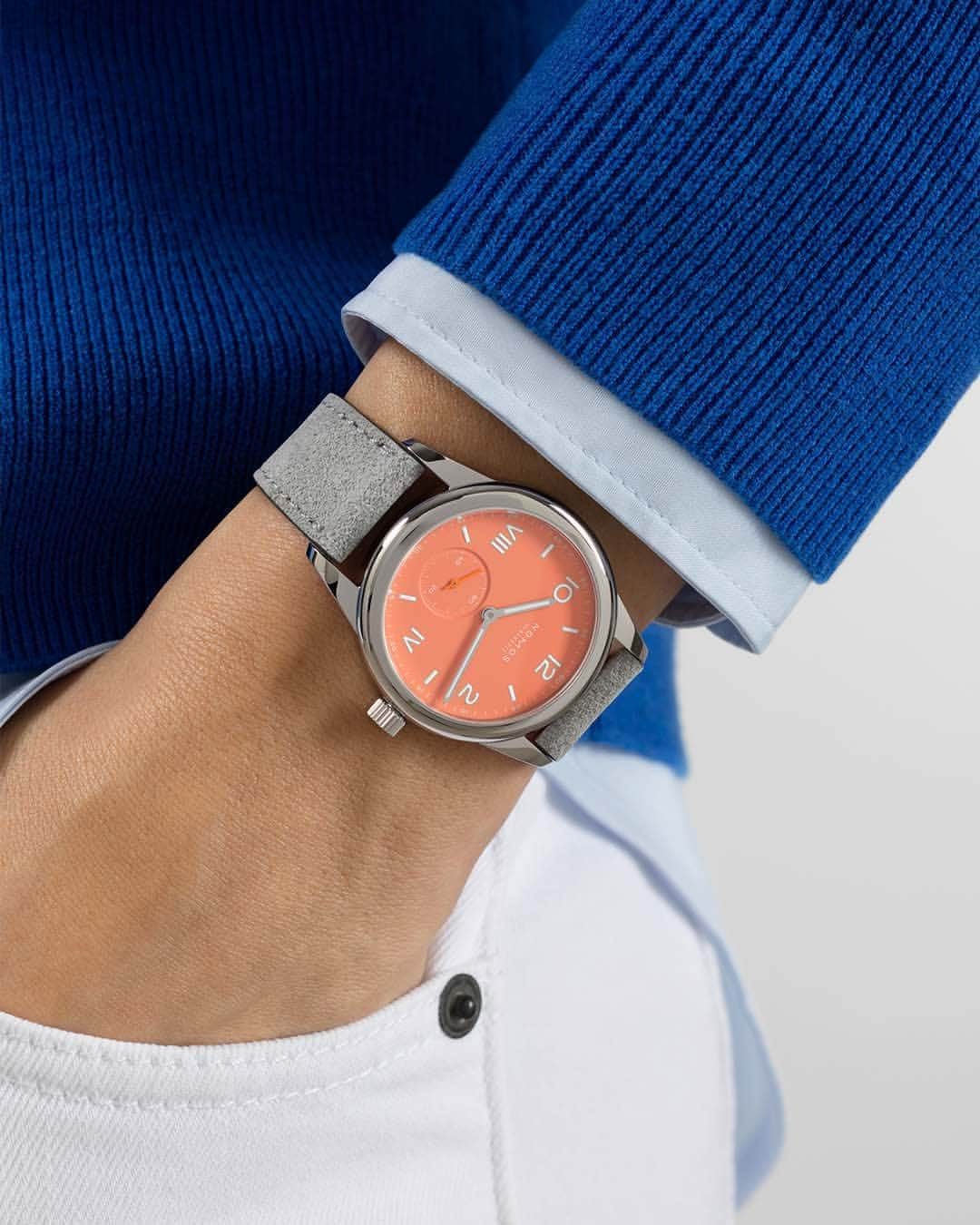 ノモスのインスタグラム：「The Easter weekend has just started—and our brand-new Club Campus cream coral is ready to add a fresh touch to the wrist. It can also be combined with a bracelet for a sportier look.  #nomos #nomosglashuette #glashütte #madeinglashuette #watchmaking #nomosclub #eastern #easter #eastergift #watchfam #happyeaster #nomosclubcampus」