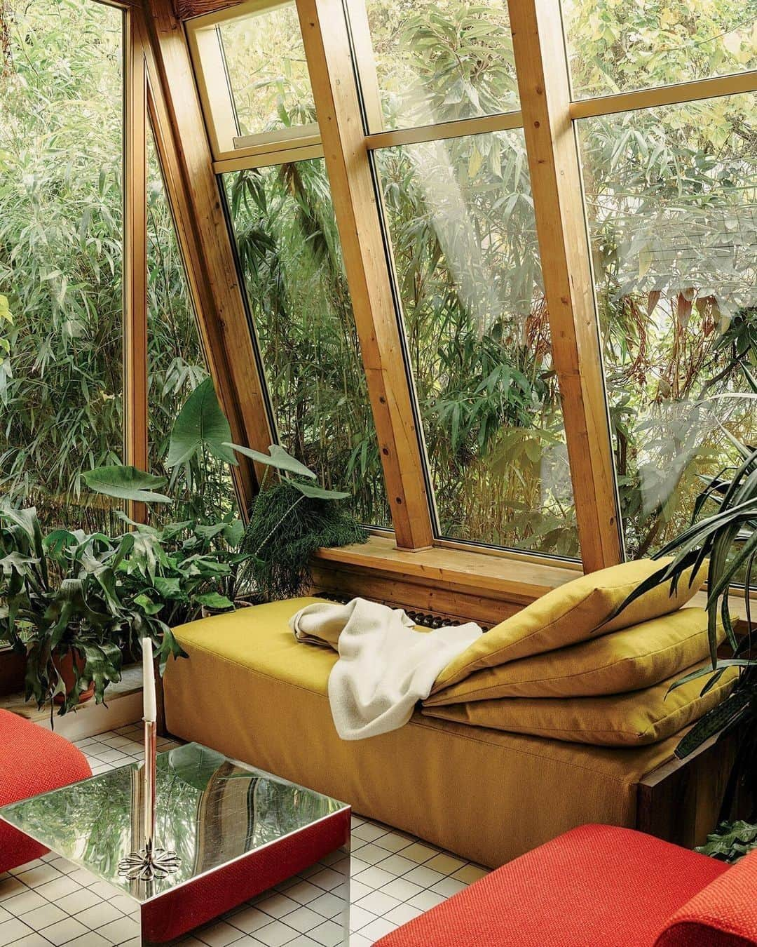 Meganさんのインスタグラム写真 - (MeganInstagram)「Room with my favourite type of view 🌿   Art consultant and dealer Peter Heimer's postwar Berlin townhouse. Via @tmagazine Photo by @RobertRieger . . . . #roomwithaview #trees #bamboo #peterheimer #garden」4月8日 23時21分 - zanzan_domus