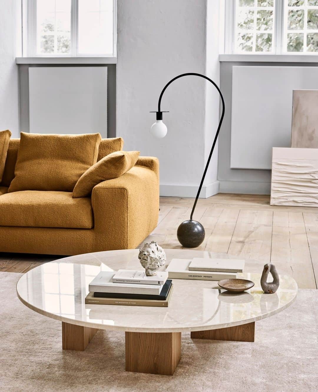 eilersenのインスタグラム：「The Puzz table with a tabletop in travertine marble complements the oak legs beautifully. Style it with all your favourite pieces.⁠ ⁠ ⁠ ⁠ ⁠ ⁠ ⁠ ⁠ ⁠  ⁠ #eilersen #eilersenfurniture #myeilersen #enjoyaneilersen #puzz #homedecor #sofa #danishdesign #inredning #finahem #interiorlovers #interiordesign #modernliving #minimalism #nordiskehjem #nordicinspiration #nordicliving #craftsmanship #luxurylifestyle #boligindretning #designinterior #livingroominspo #boliginspiration #softminimalism #hemindredning #schönerwohnen #nordicminimalism #throughgenerations」