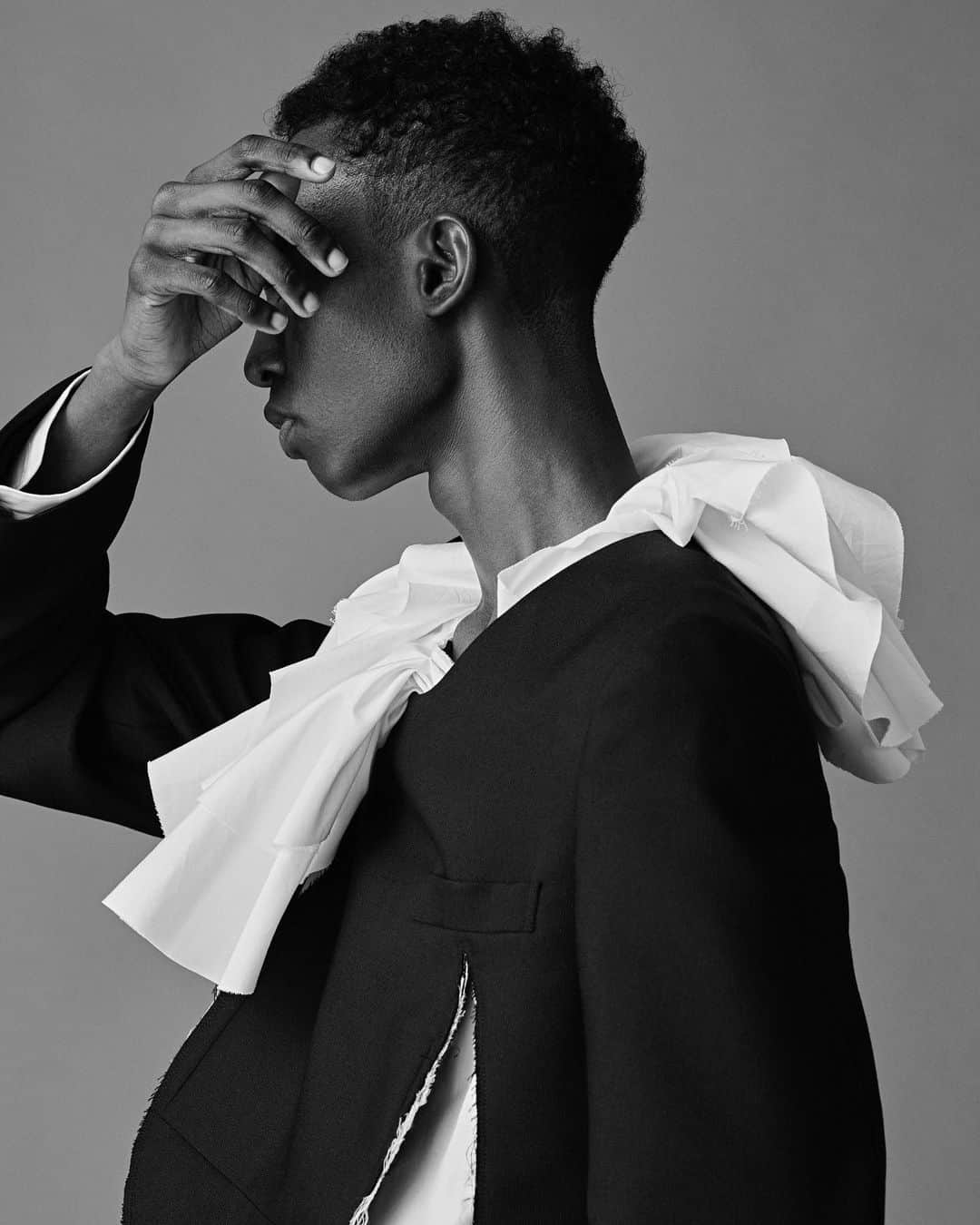 コム・デ・ギャルソンのインスタグラム：「@mapsworld_kr Photographer: @tetsuya_maehara Stylist: @masahiro_hiramatsu Hair&Make: @ken_yoshimura Models: @woonoow @mohamed.azhari.ahmed All clothes Comme des Garçons HOMME PLUS SS23」