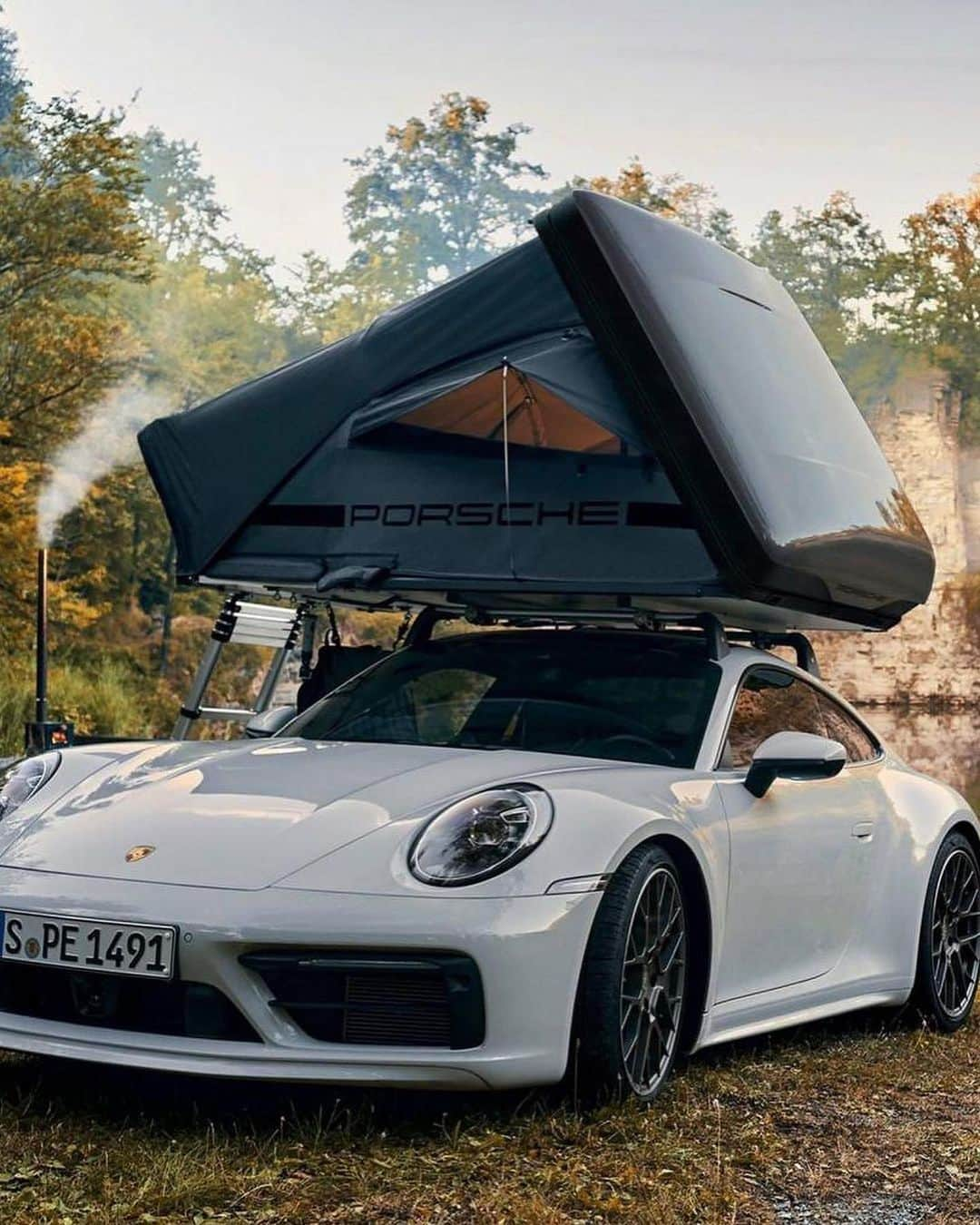 The Luxury Lifestyle Magazineさんのインスタグラム写真 - (The Luxury Lifestyle MagazineInstagram)「Porsche is known for some of the most exclusive, iconic, and innovative sportscars; however, it’s not known for camping tents.   The German sportscar maker recently introduced a camping tent for a jaw-dropping $5,000. The tent attaches to Porsche’s sports car, and you’re ready for a camping trip in no time.   Furthermore, the tent also comes with a comfy mattress measuring 210cm by 130cm.   By: Porsche」4月9日 8時42分 - luxurylifestylemagazine