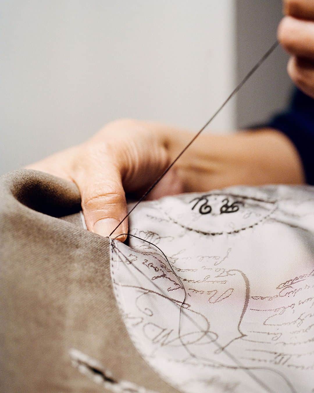ベルルッティのインスタグラム：「- DISCOVER THE ART OF BESPOKE TAILORING BY #BERLUTI -   The upcoming Cannes Film Festival season is the perfect time to don your most dapper look. At Berluti, that means a bespoke suit. Handcrafted in the Parisian atelier on rue de Sèvres, it is the result of an exacting process involving conversations with clients, choosing fabrics, taking measurements, sketching and sewing, in order to achieve a one-of-a-kind garment.」