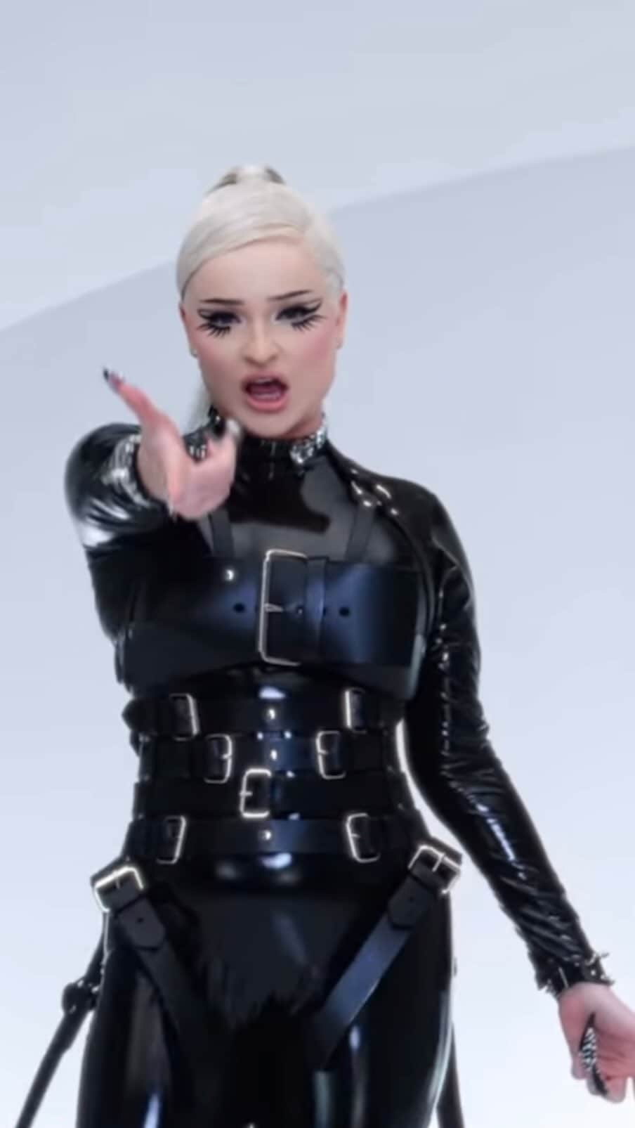 ZANA BAYNEのインスタグラム：「How it started VS how it’s going: Kim Petras in Zana Bayne Custom for “Alone” 🌹 @kimpetras in custom Buckle Bra & Corset Belt layered over @bustedbrand catsuit styled by @shabhain」