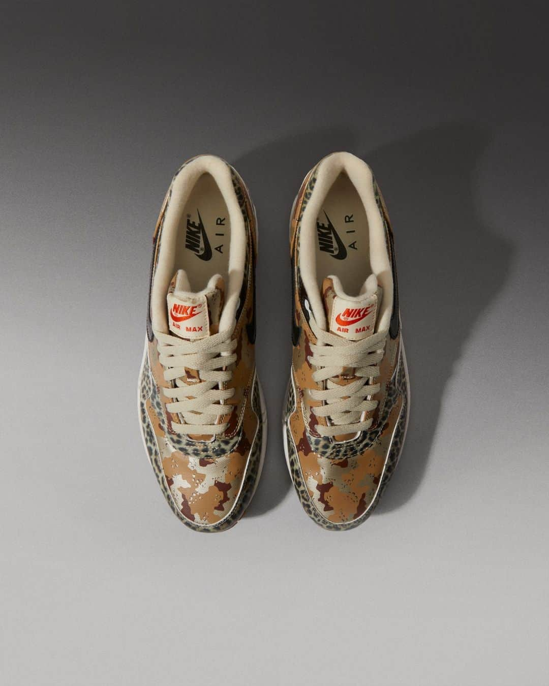 Flight Clubのインスタグラム：「In the wild. Pops of leopard print and desert camo enshroud the Wmns Air Max 1 PRM 'Atmos.' A continuation of the Tokyo retailer's 2013 'Animal Camo' pack, the renown lifestyle runner is finished with premium snakeskin detailing on the Swoosh.」