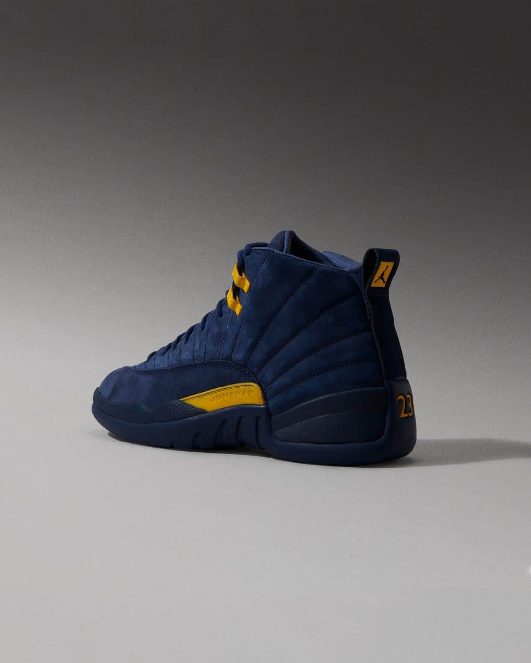 Flight Clubのインスタグラム：「Go blue. Released in 2018, the Air Jordan 12 Retro 'Michigan' brings a college-exclusive colorway to the streets. Wolverine-inspired navy blue suede meets Amarillo hits on the upper. University of Michigan branding on the tongue completes the collegiate look.」