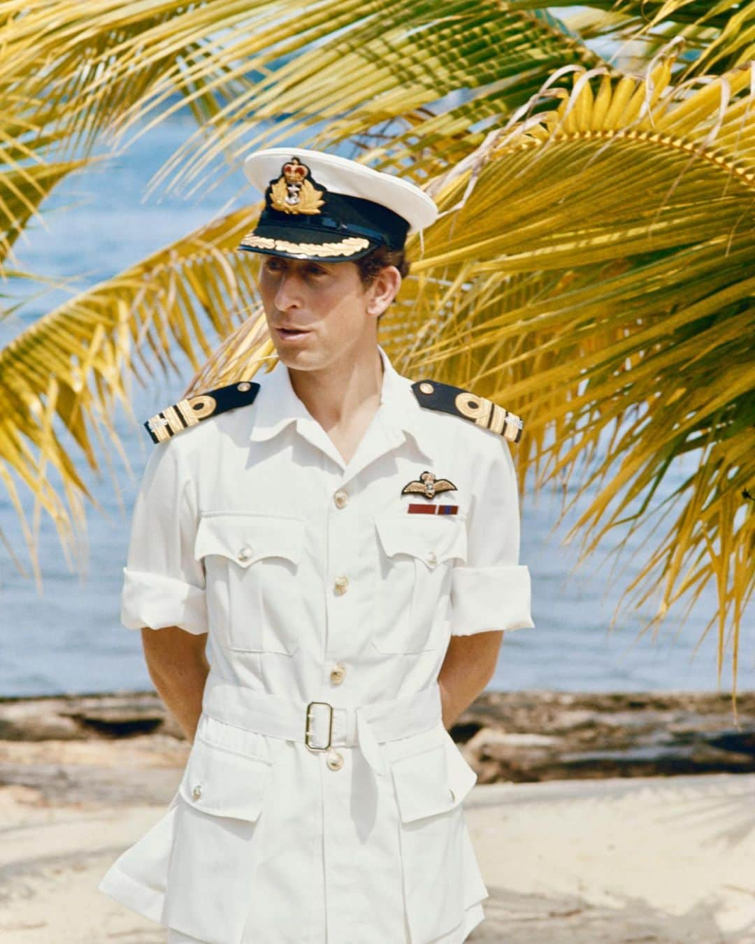 ギーブス&ホークスのインスタグラム：「On this truly momentous day, Gieves & Hawkes simply wish to say “GOD SAVE THE KING!”  Image: HRH Prince of Wales, Ghana March 1977.  Uniform: Gieves Royal Navy Tropical Bush Jacket, Rank of Commander with Pilot's Wings.  Ribbons: Order of the Bath and Queen's Coronation Medal.  @theroyalfamily  @royalnavy」