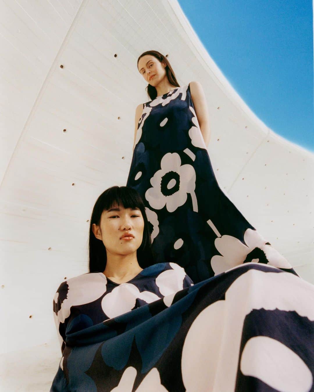 マリメッコのインスタグラム：「Meet this season’s Unikko icons. Are you feeling daring blue or pastel pinks?   Explore the new dress capsule at marimekko.com. Link in bio.   #marimekko #SS23 #brightvisions」