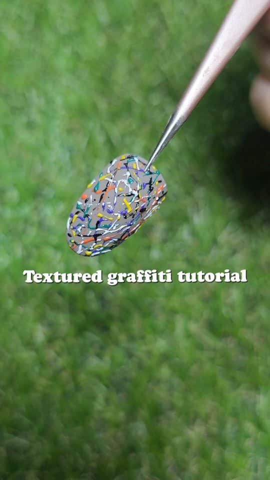 Yingのインスタグラム：「👩‍🏫✍️💅 Textured graffiti tutorial!  Products used: 📌 PREGEL #282 Pale Sesame 📌 PREGEL Art Liner Gels in Black, White, Orange, Yellow, Purple and Green 📌 Lumine Detail Brush (launching in June!)  📌 Bettygel Frosting Mat Top  𝐒𝐡𝐨𝐩 𝐰𝐢𝐭𝐡 𝐮𝐬 𝐨𝐧𝐥𝐢𝐧𝐞⁣⁣⁣⁣⁣⁣⁣⁣⁣⁣⁣⁣⁣⁣⁣⁣⁣⁣⁣⁣⁣⁣⁣⁣⁣ 🛒 www.nailwonderland.com⁣⁣⁣⁣⁣⁣⁣⁣⁣⁣⁣⁣⁣⁣⁣⁣⁣⁣⁣⁣⁣⁣⁣⁣⁣ ⁣⁣⁣⁣⁣⁣⁣⁣⁣⁣⁣⁣⁣⁣⁣⁣⁣⁣⁣⁣⁣⁣⁣⁣⁣ 𝐎𝐫 𝐯𝐢𝐬𝐢𝐭 𝐮𝐬 𝐚𝐭 𝐨𝐮𝐫 𝐬𝐭𝐨𝐫𝐞⁣⁣⁣⁣⁣⁣⁣⁣⁣⁣⁣⁣⁣⁣⁣⁣⁣⁣⁣⁣⁣⁣⁣⁣⁣ 📍20 Penhas Road Level 2, Singapore 208184⁣⁣⁣⁣⁣⁣⁣⁣⁣⁣⁣⁣⁣⁣⁣⁣⁣⁣⁣⁣⁣⁣⁣⁣⁣ (5 minutes walk from Lavender MRT)⁣⁣⁣⁣⁣⁣⁣⁣⁣⁣⁣⁣⁣⁣⁣⁣⁣⁣⁣⁣⁣⁣⁣⁣ ⁣⁣⁣⁣⁣⁣ ⁣⁣⁣⁣⁣⁣ ⏰ 𝐎𝐩𝐞𝐫𝐚𝐭𝐢𝐧𝐠 𝐇𝐨𝐮𝐫𝐬⁣⁣⁣⁣⁣⁣⁣⁣⁣⁣⁣⁣⁣⁣ Tuesday to Friday: 11am-6pm Sunday: 11am-6pm We are closed on Monday, Saturday & Public Holidays⁣⁣」