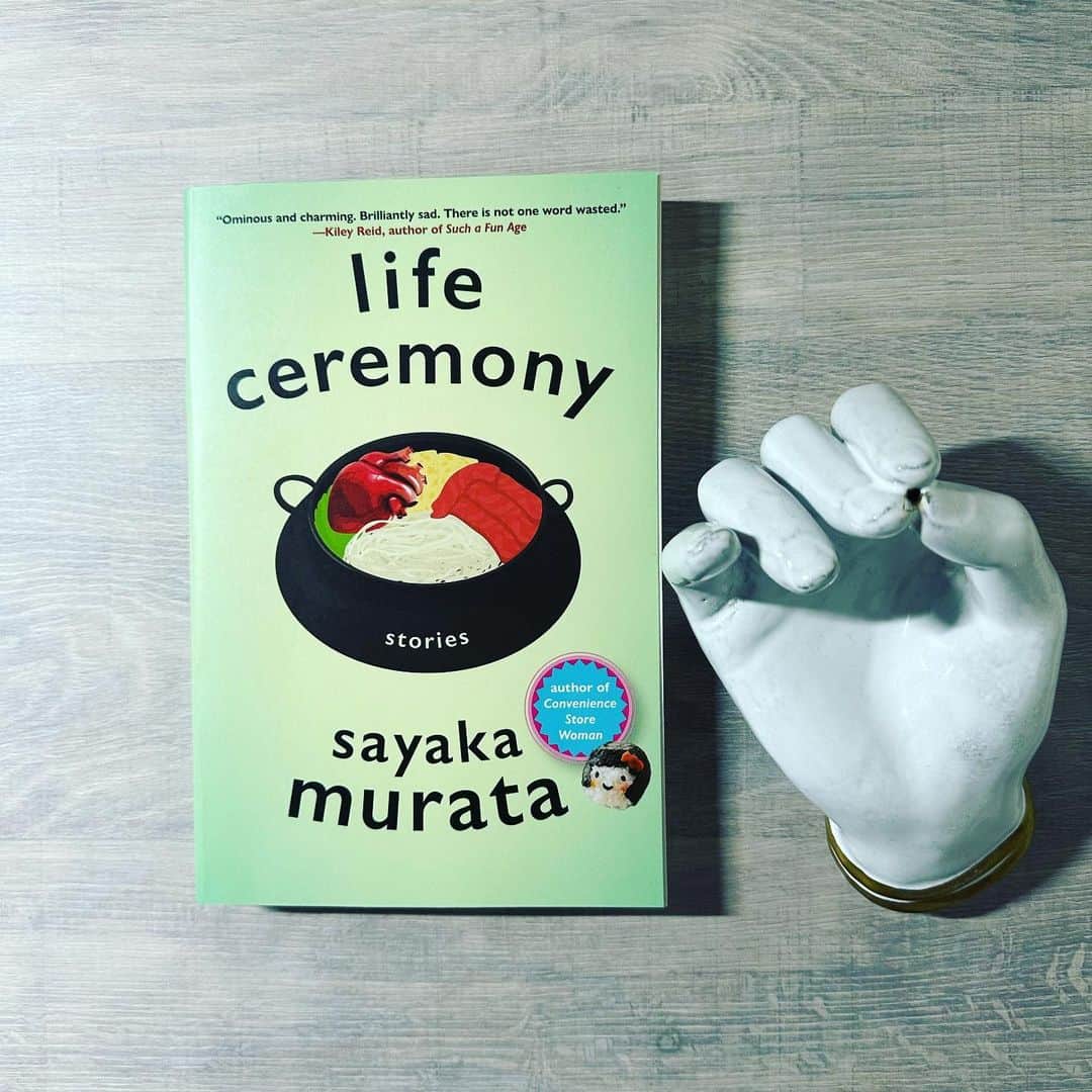 村田沙耶香のインスタグラム：「The paperback of the American edition of LIFE CEREMONY has arrived in Japan. It is a very beautiful book! And there is an Onigiri girl. Thank you from the bottom of my heart @groveatlantic 🌹  アメリカ版の『生命式』のペーパーバックが日本に届きました。 とても美しく、おにぎりの子もいてうれしいです。@groveatlantic さんに心からお礼をお伝えいたします！」