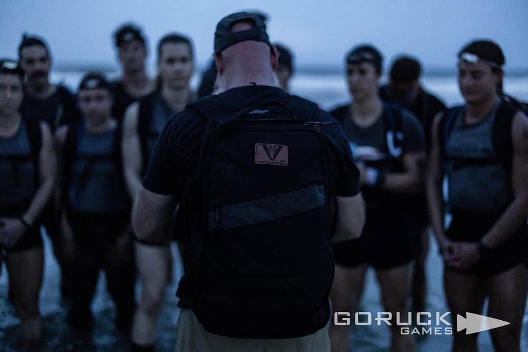 カーリー・ウォパットさんのインスタグラム写真 - (カーリー・ウォパットInstagram)「GORUCK GAMES // EVOLUTION 002: HIGH WALKER  “I bet you’re thinking, what is a place like me doing in a girl like this?”  I overheard this quote while my roommate was watching “The Mummy”, and it stuck with me because I thought it was funny. Throughout this evolution, it kept replaying in my head. As we ran through ocean water & fog with 30# rucks on our backs, saturated socks & shoes squishing with every step, and a 50# flag pole held like a torch at the front of our mad assembly charging through the night.. the hilarity of our current reality made me want to both burst out laughing and crying at the same time. This, however, is what I’m here for.   Evolution 2 turned out to be a 16 mile ruck on the beach, starting at sunset, and continuing through the dark. We began by getting wet & sandy, assuring that discomfort was prevalent. The instructions were simple: run. And don’t stop until you’re told to. Which led us all to face the question: can I keep going when there’s no end in sight? Better yet, how do you pace a race of unknown distance? Run fast, but not too fast. Don’t be first, but don’t be last.   It was a spiritual thing. Eventually, all things come to an end. But you must keep going. The philosophical parallels to life were overwhelming, and they take time to reflect on and fully sink your teeth into. But I bit down hard on this one, and kept putting one foot in front of the other.  At first I just told myself to keep up. And I did. I stayed with the group for the first 4 miles. A cadre member told us to turn around, so I prayed that our starting point would be our finish line, totaling 8 miles. But we kept running. Another 4 miles in the opposite direction, then back. 16 miles total.   I started to fall behind after mile 4. I could see green glow sticks on rucks elusively in the distance. I was alone most of the time, and feeling left behind evoked a sense of desperation.   I found spurts of energy. The ocean water splashing over my shoes seeped some life back into me. Doubts crept in. Pain. My feet hurt like hell. I ran out of water. I’d pass a few other lone soldiers from time to time. Hey brother. Hey sister. Keep going.   And we did.」5月7日 3時43分 - carlywopat