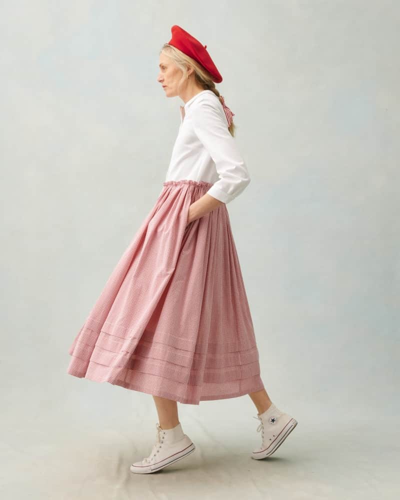 キャベジズ&ローゼズのインスタグラム：「At Cabbages & Roses, we have a fondness for a perfect gingham and sturdy white cotton drill. Natalia is just this, with a beautiful white bodice and a Peter Pan collar with bracelet length sleeves and a full red gingham skirt. A very jolly dress for the Spring.  #CabbagesandRoses #NewArrival #ThisGloriousLife #SS23」
