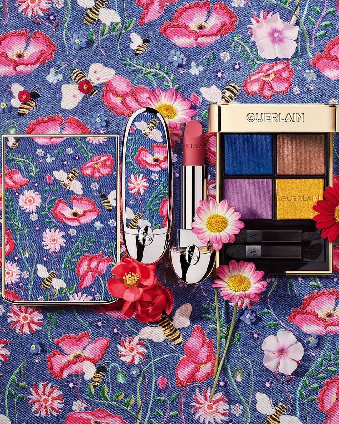 のインスタグラム：「Discover the Floral Denim Collection by Laura Gulshani. A limited-edition collection of two ultra-collectible Rouge G cases and seasonal Ombres G Palette with four delicious new summer shades: dreamy lilac, buttercup yellow, golden brown and Violette's iconic bold blue. ​  #Guerlain #GuerlainMakeup​」