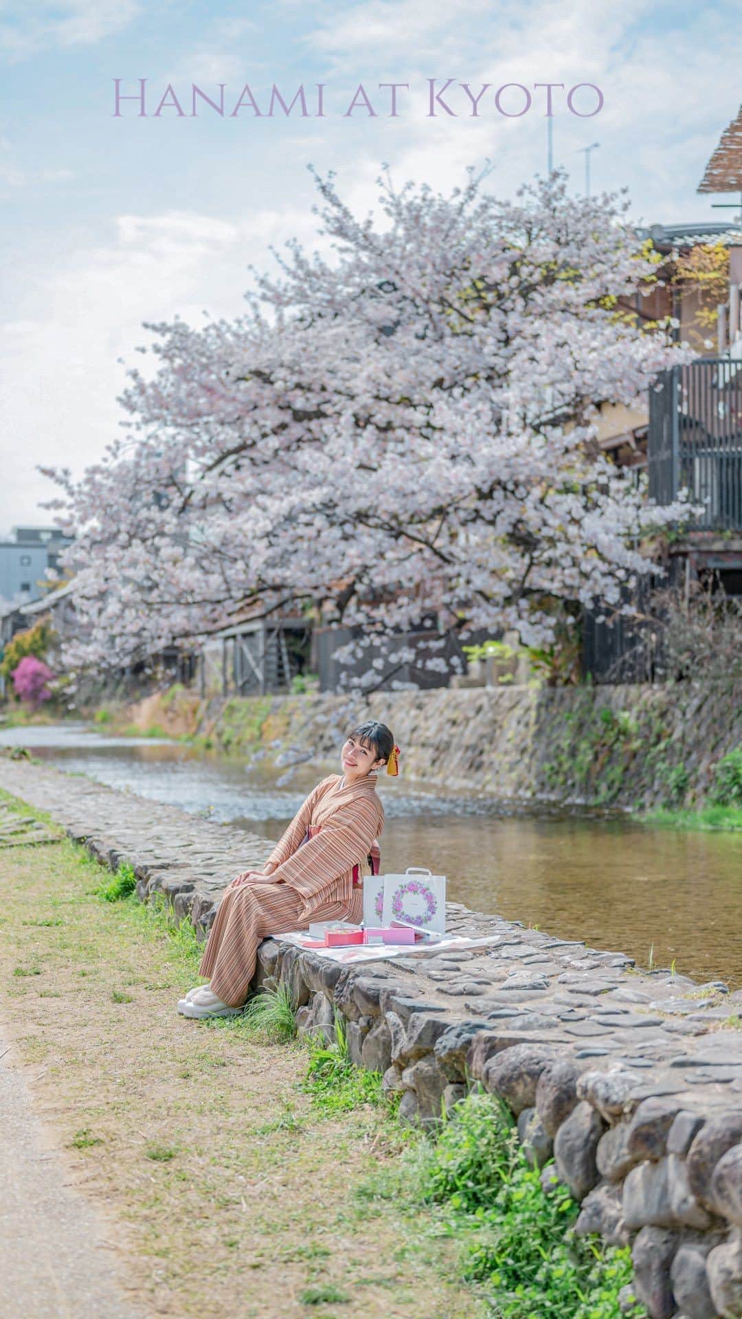 のインスタグラム：「【Hanami at Kyoto🌸】   Did you know that the famous Kamogawa River is just a 5-min walk from Takashimaya Kyoto?   If you visit in spring, Kamogawa is hugged by pink petals along the river bank!   I’d suggest a hanami picnic! I got my delicious bento, the most beautiful spring themed wagashi and cherry-blossom snacks from @kyoto_takashimaya, walked over to Kamogawa and sat under the cherry trees.   It was a perfect spring afternoon🥹🌸🙏🏻. If you come to Kyoto, do remember to drop by Takashimaya Kyoto!   📍access: directly connected to Kyoto -　Kawaramachi Station on the Hankyu Kyoto Line   #takashimaya #kyoto」