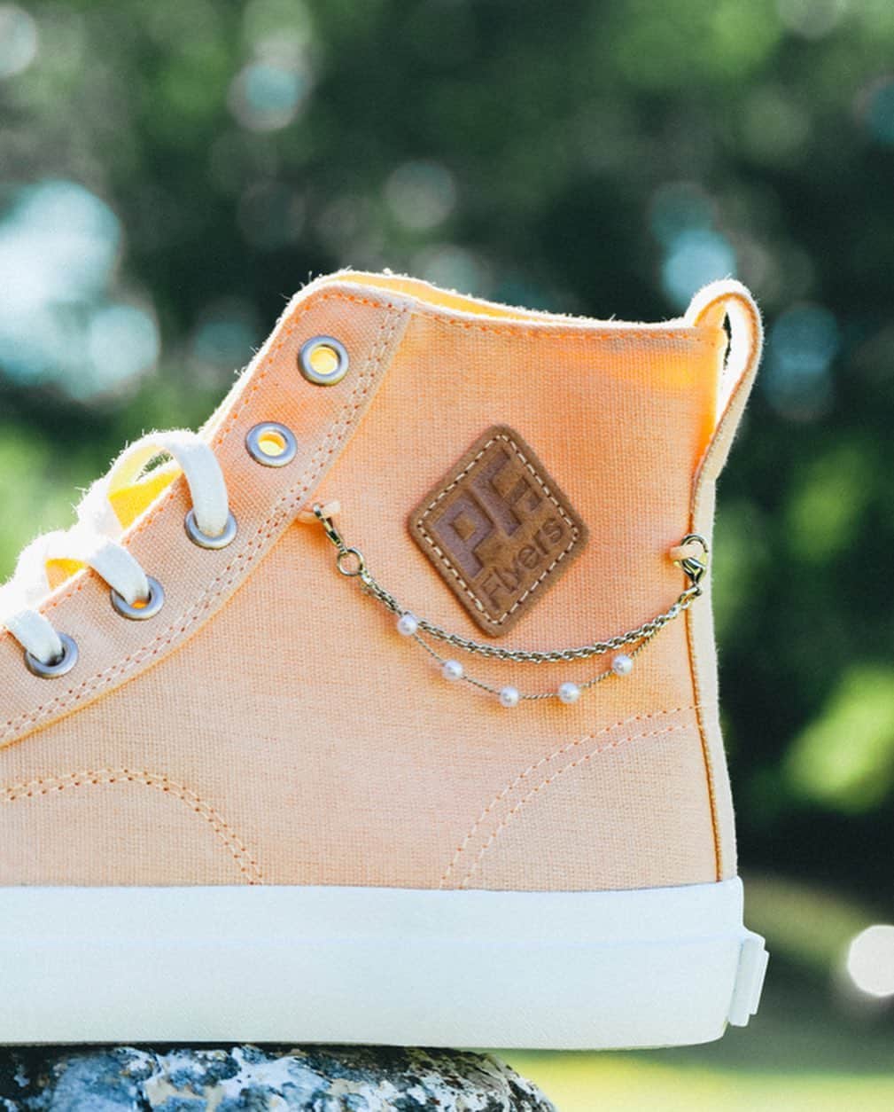 PFフライヤーズのインスタグラム：「This modern twist on the All American Hi, featuring gold and pearl shoe-lry, is designed to elevate your everyday sneaker game and put your personal style center stage.」