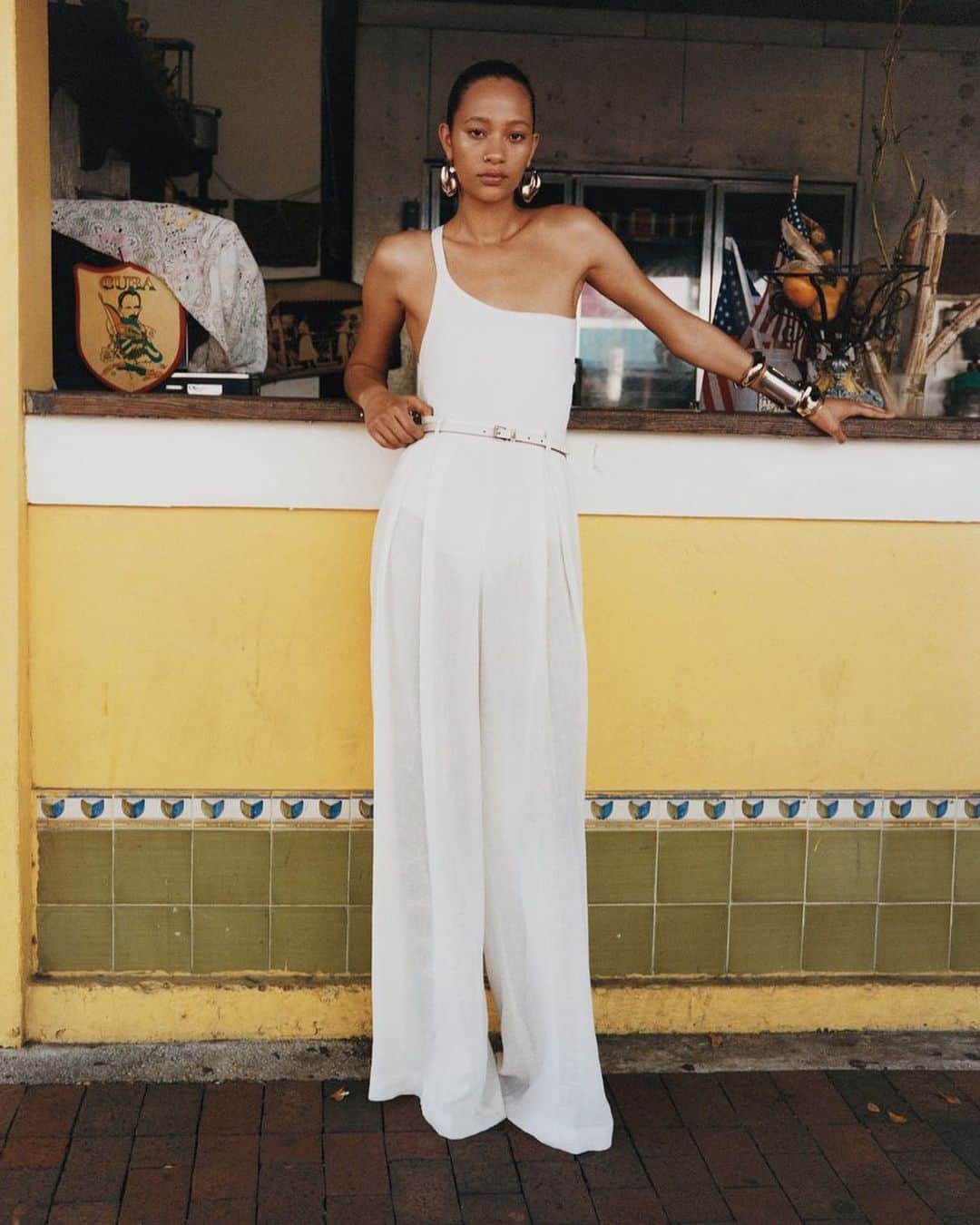 のインスタグラム：「#SelenaForrest in a halter bodysuit and linen palazzo pants from the Spring/Summer 2023 #MichaelKorsCollection runway for her April cover shoot of @WSJMag.  Photographed by @angelopennetta Styled by @sarrjamois」