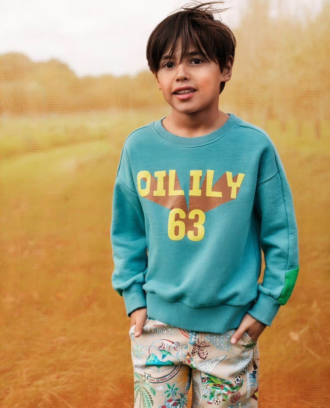 オイリリーのインスタグラム：「🙋🏻‍♂️Meet Oilily's Hanz Sweater!⁠ The warm saturated colours hint to the nostalgia of the year that we were founded: 1963. Yet the fit of this sweater is very now; cool, comfy and easy.⁠ ⁠ ⁠ ⁠ ⁠ ⁠ .⁠ ⁠ #Oilily #Oililyworld #planetb #abrighttomorrow⁠ #printonprint #Oililyandme #ss23 #newcollection #newseason #kidssfashion #kidscouture #wearcolor #springsummer #fashiontrend ⁠#boysfashion #boyswillbeboys #1963 #springvibes #newarrivals #springcollection #springishere #springiscoming #fashiondaily #springessentials #springlayering」