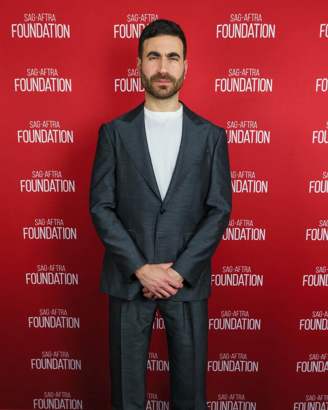 カナーリのインスタグラム：「@mrbrettgoldstein attends the SAG-AFTRA Foundation Screening Room Event wearing a #Canali1934 dark grey crosshatch suit. #CanaliSS23」