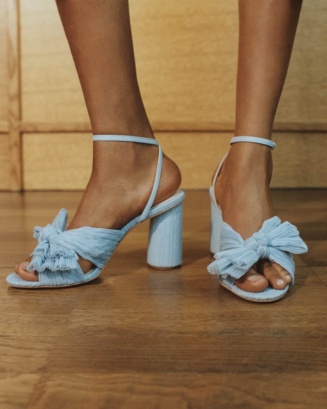 ネッタポルテのインスタグラム：「HAPPY FEET: The perfect finishing touch to cheerful midi dresses, @loefflerrandall's 'Camellia' sandals will easily become your summer soirée go-to.  Tap the link in bio to shop at #NETAPORTER.」