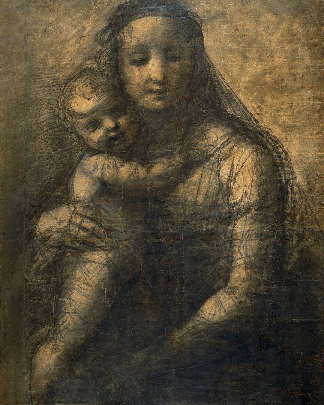 大英博物館のインスタグラム：「How can drawings help us understand how paintings looked in the past? 🔎 🖼  This image of the Virgin and Child was created by the Italian Renaissance artist Raphael.  When creating large-scale paintings, Raphael would refine his composition using cartoons – enormous drawings which were used like a stencil to transfer designs. This image is a cartoon for Raphael’s ‘Madonna of the Tower’, which is in the National Gallery.  Unfortunately, the painting is damaged, in part because it was transferred from panel to canvas in the 18th century, but this cartoon gives us a glimpse into how it might have originally looked.   The lighting in Raphael’s drawing is much softer and more atmospheric than  in the painting, making the faces look gentle and lifelike. Their expressions  also have more emotional depth: the Virgin turns away and her eyes are  downcast, which contrasts with the joyous smile on Christ’s face as he  embraces his mother.  🔎 Raphael (1483–1520), cartoon for the painting ‘Madonna of the Tower’ or ‘The Mackintosh Madonna’. Chalk and charcoal on two conjoined sheets of paper, pricked for transfer. Umbria, Italy, around 1509–1511.   #BritishMuseum #Raphael #RenaissanceArt」