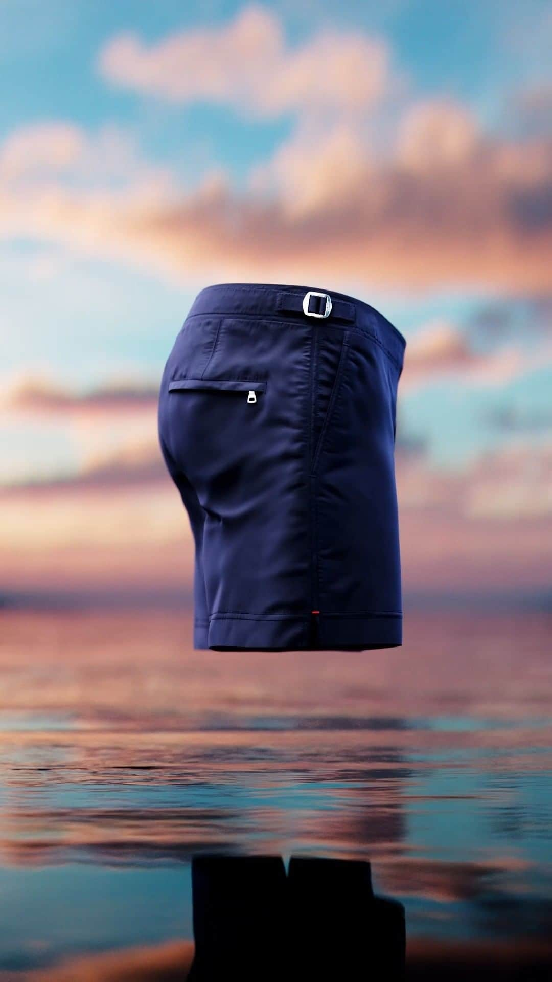 オールバーブラウンのインスタグラム：「Bulldog.  The original and still the best tailored swim shorts. Drawn from the pattern of a traditional men’s trouser, 60 individual pieces come together in unique fit and finish,  Stitched to perfection with detailed highlights where form meets function. Effortless style taking you from beach to bar to beyond.  Quick dry, slow wear.  Made from recycled plastic waste. Guaranteed for 5 years. The Bulldog is not a swim short.  It’s a short you can swim in.  🎥 @not.just.any   #OBShortStories #ClassicOB #OBBulldog #HolidayBetter」