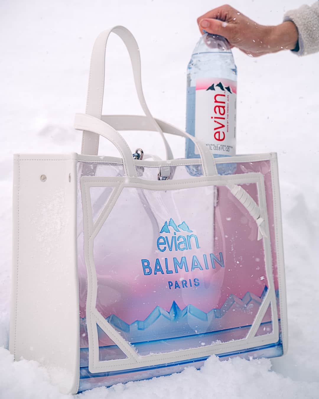 evianのインスタグラム：「BALMAIN x EVIAN​  Relying on a wide variety of eco-friendly practices, materials and innovations, the #BALMAINxEVIAN collection places the collaboration’s focus squarely on the powerful possibilities of a future world of fashion sustainability, all grouped under the distinctive belief that Together, Change is Beautiful.​  Click our bio link to discover the eye-catching, limited-edition ready-to-wear and accessory designs on Balmain.com」