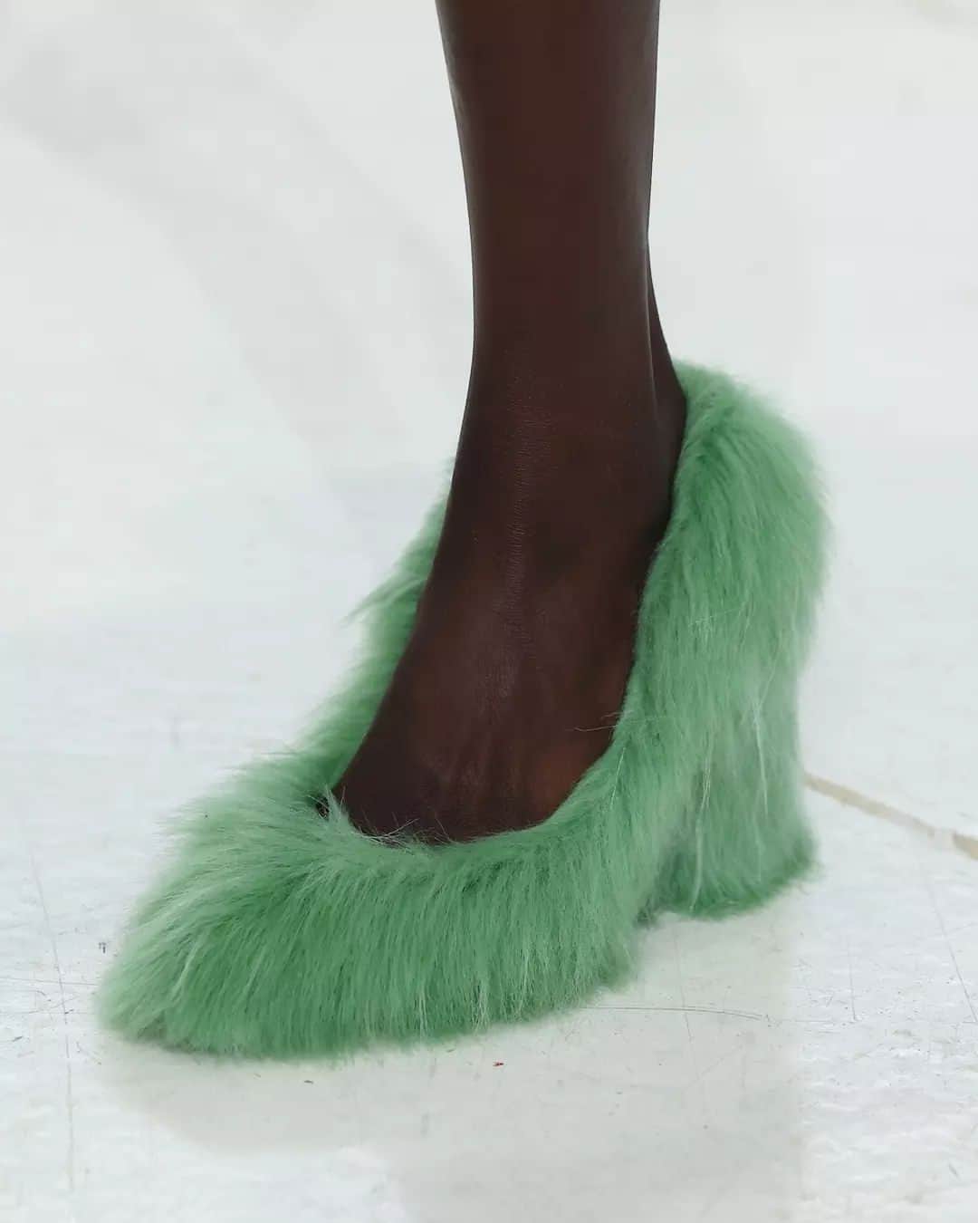 Fashion Weekのインスタグラム：「Come on Barbie, let's go party. If you were wondering what a #Barbie shoe collection looks like, it would be this. Scroll to see the #SS23 and #AW23 collections that were obsessed with "doll shoes".   What other brands would you dress #Barbie in?  Photos by @gettyimages」